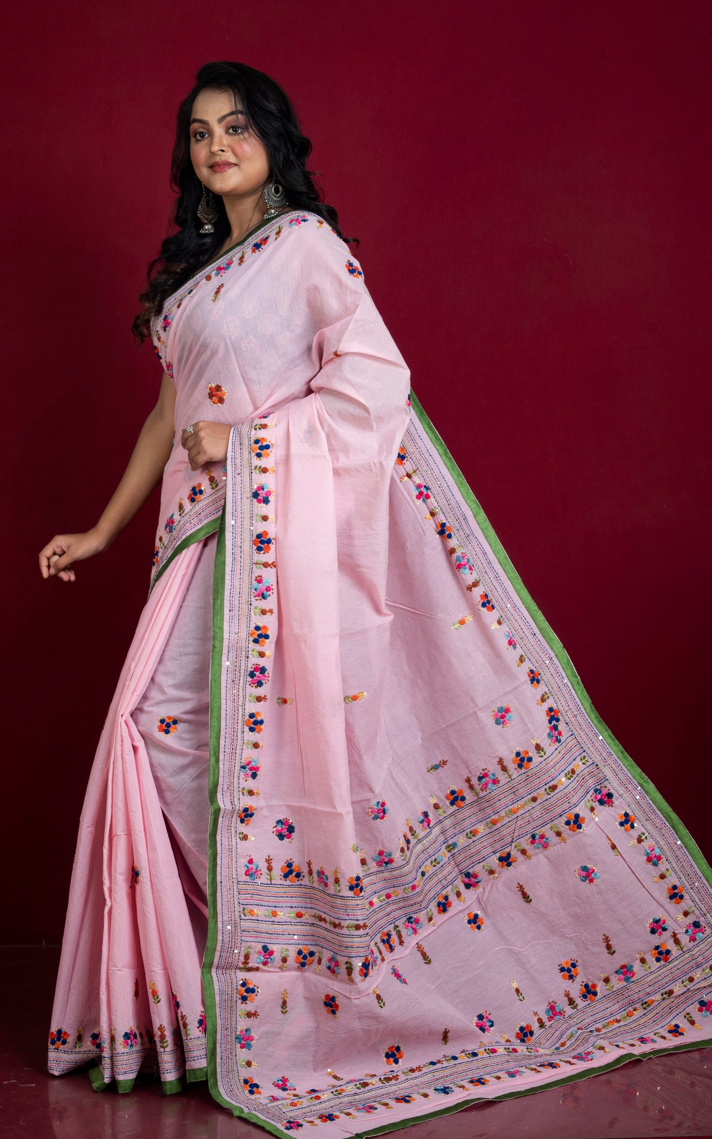 Add a touch of traditional craftsmanship to your wardrobe with our Bullion Stitch Knot Hand Work Saree. Made from soft cotton chanderi fabric, this saree features intricate powder pink, green and multicolored thread work, adding a pop of color to your ensemble. Elevate your style with this unique and vibrant saree!