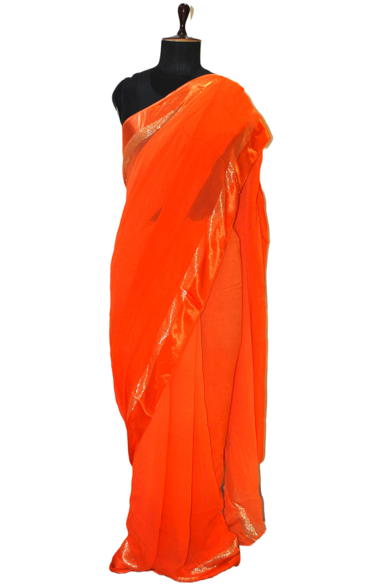 Designer Dual Shaded Georgette Saree in Orange and Silver Zari Work