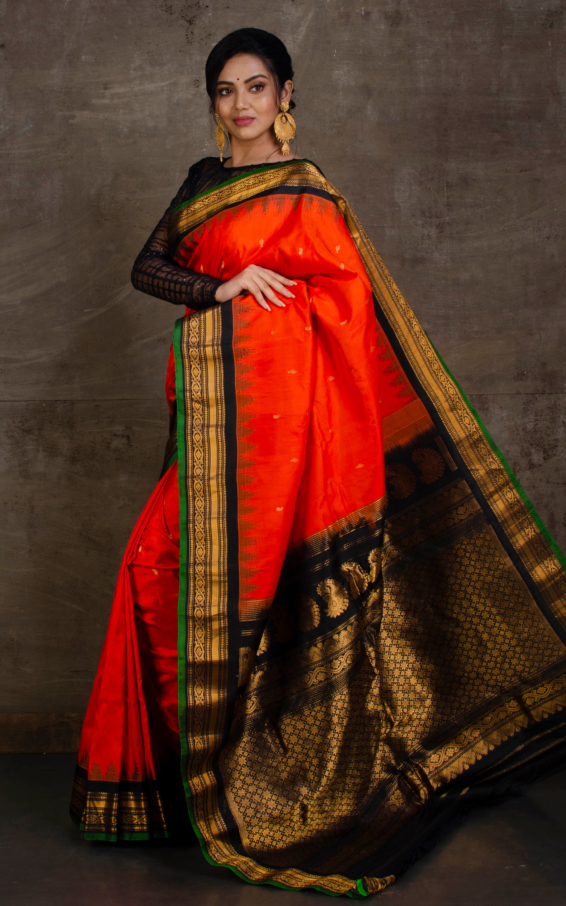 Exclusive Gadwal Silk Saree in Red Orange, Black and Green