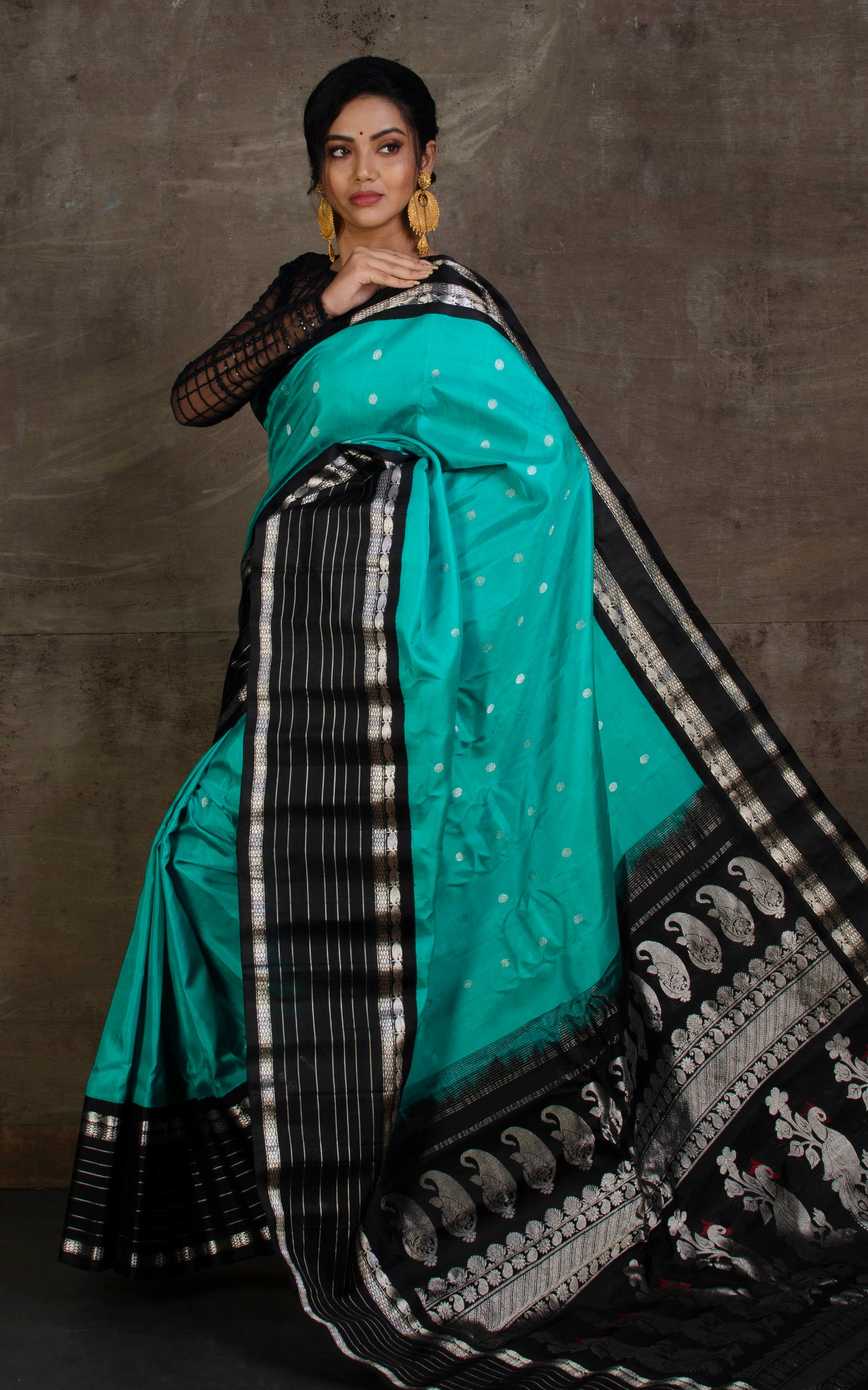 Exclusive Gadwal Silk Saree in Sea Green, Black and Silver Zari Work