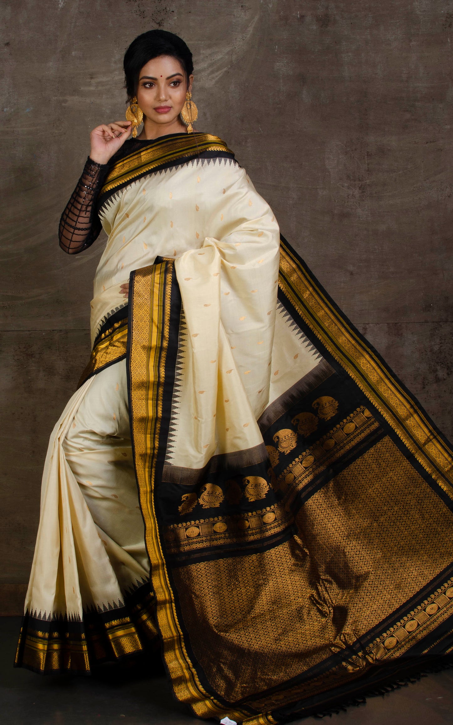 Exclusive Gadwal Silk Saree in Off White, Black and Golden Zari Work