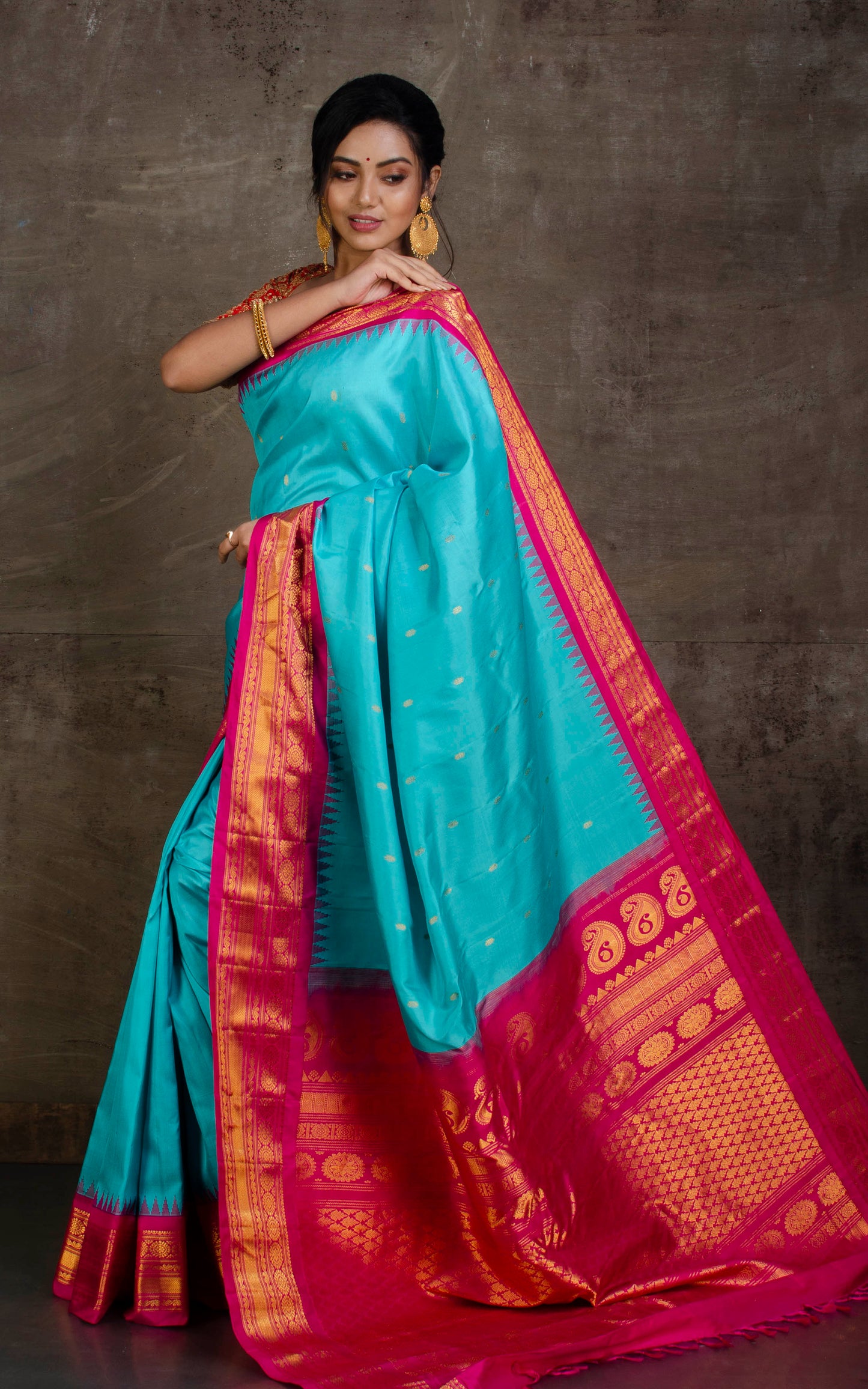 Exclusive Gadwal Silk Saree in Turquoise Blue, Dark Pink and Golden Zari Work