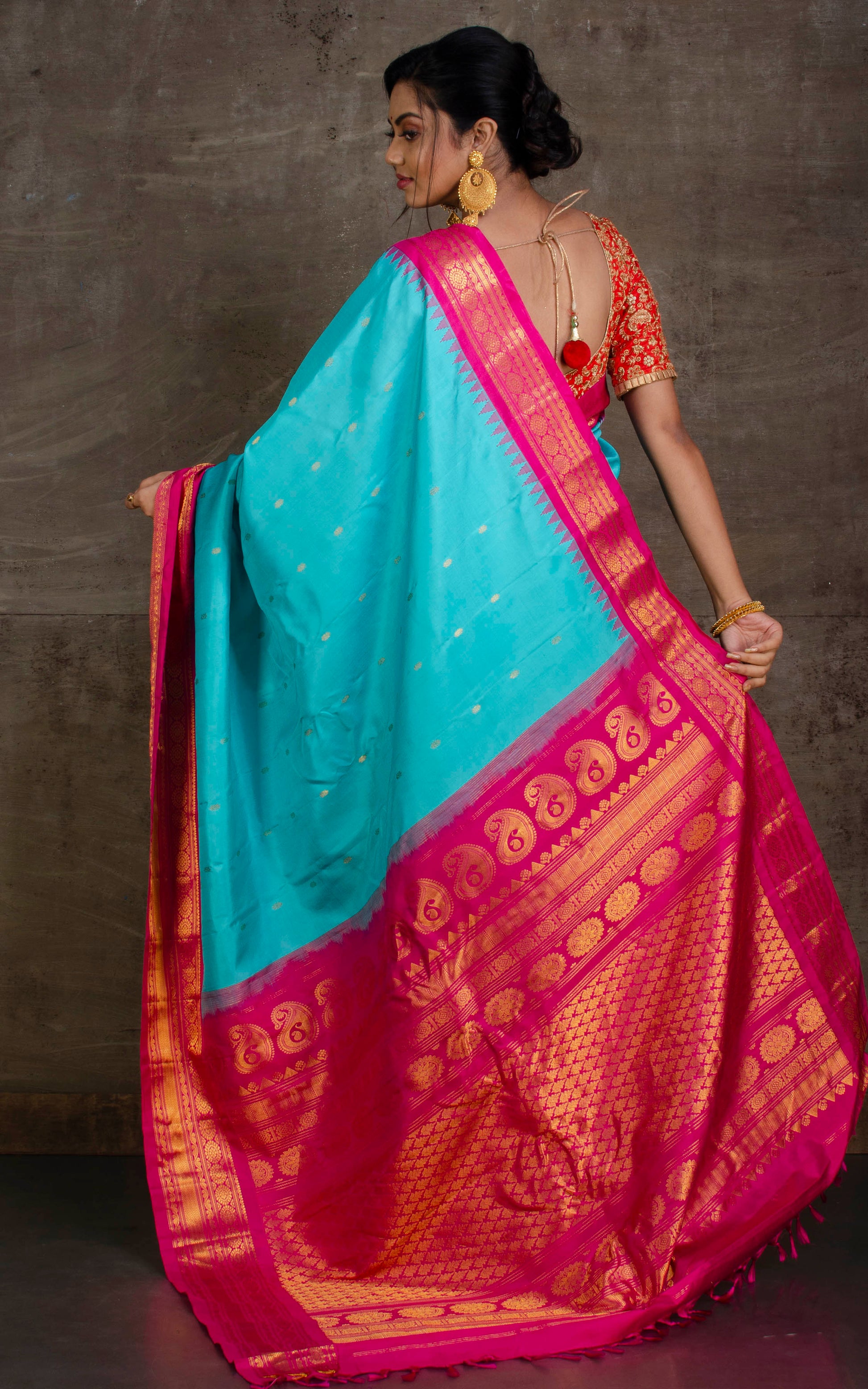 Exclusive Gadwal Silk Saree in Turquoise Blue, Dark Pink and Golden Zari Work