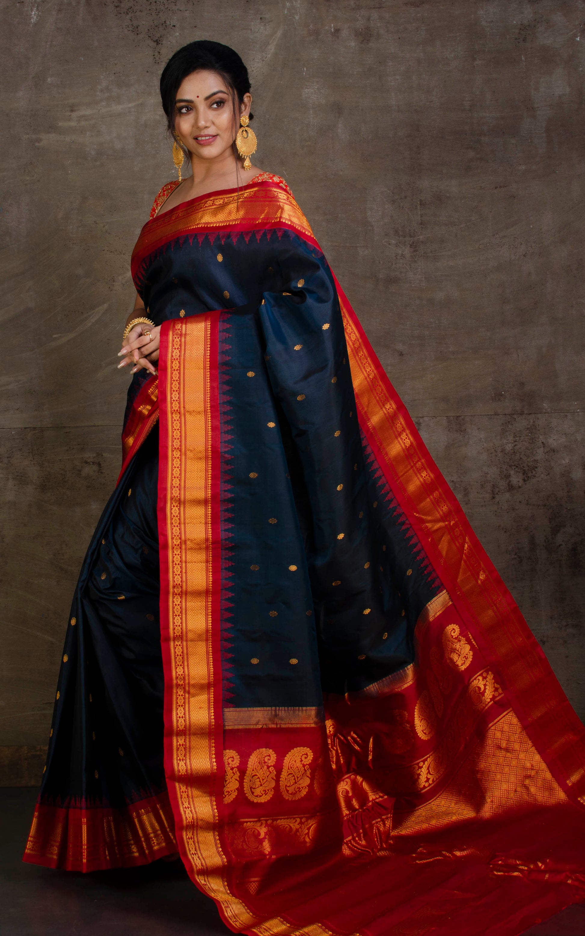 Exclusive Gadwal Silk Saree in Raven Black, Bright Red and Golden Zari Work