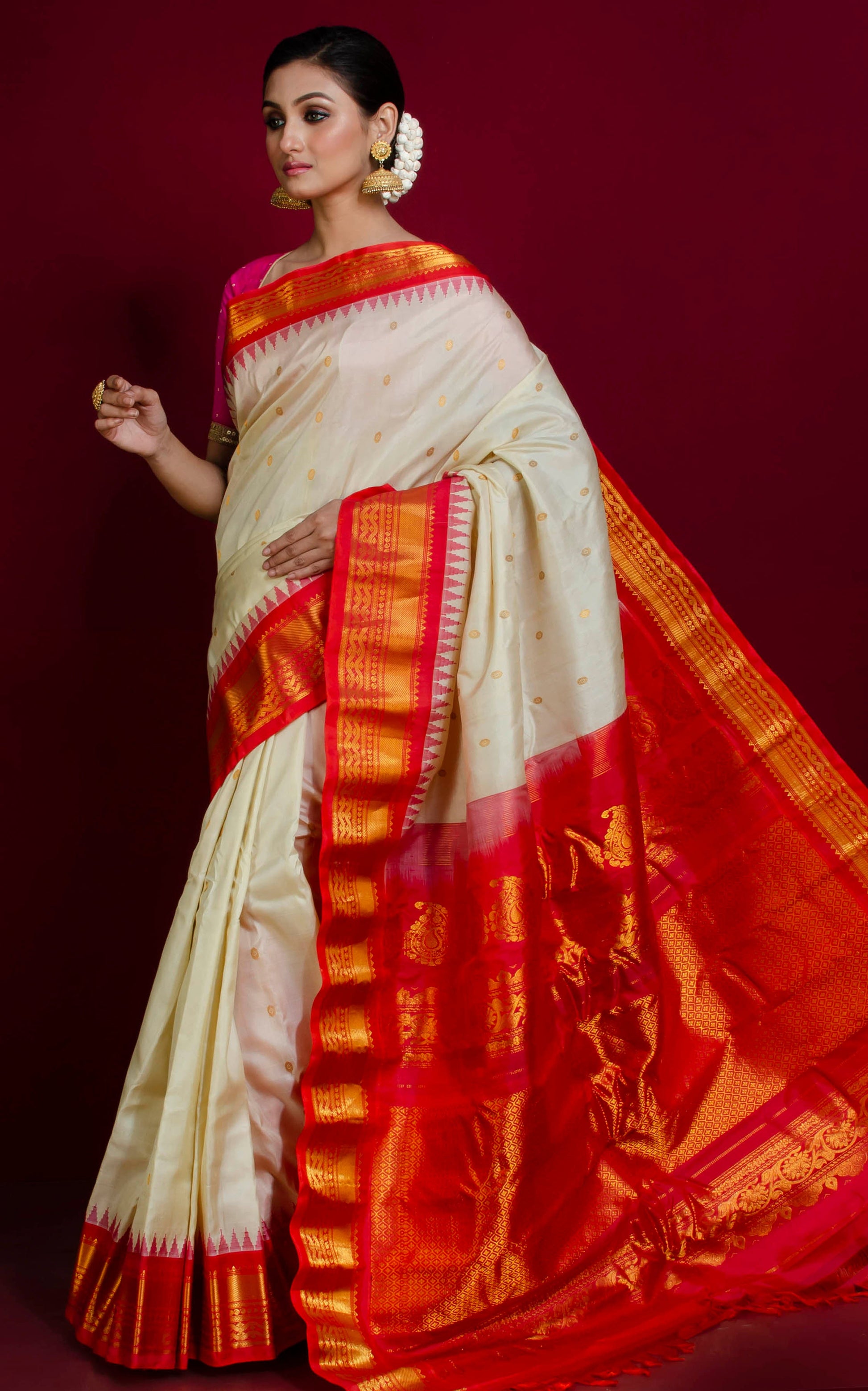 Exclusive Gadwal Silk Saree in Cream, Red Orange and Golden Zari Work