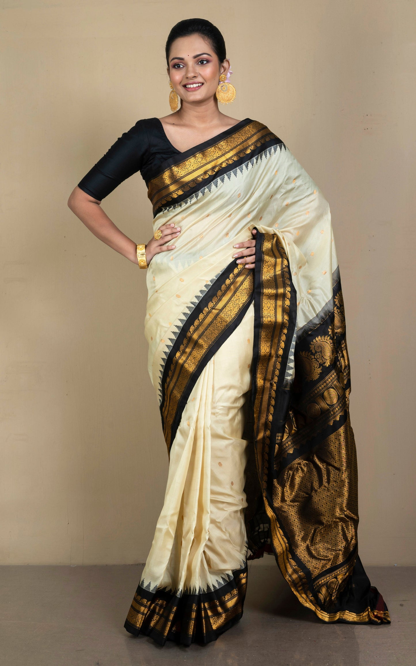 Handwoven Exclusive Gadwal Silk Saree in Off White, Zed Black and Golden Zari Work