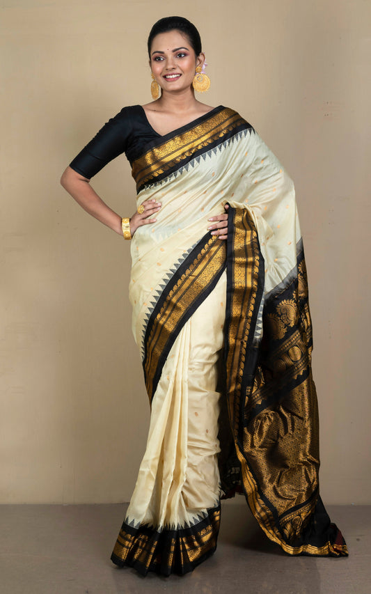 Handwoven Exclusive Gadwal Silk Saree in Off White, Zed Black and Golden Zari Work