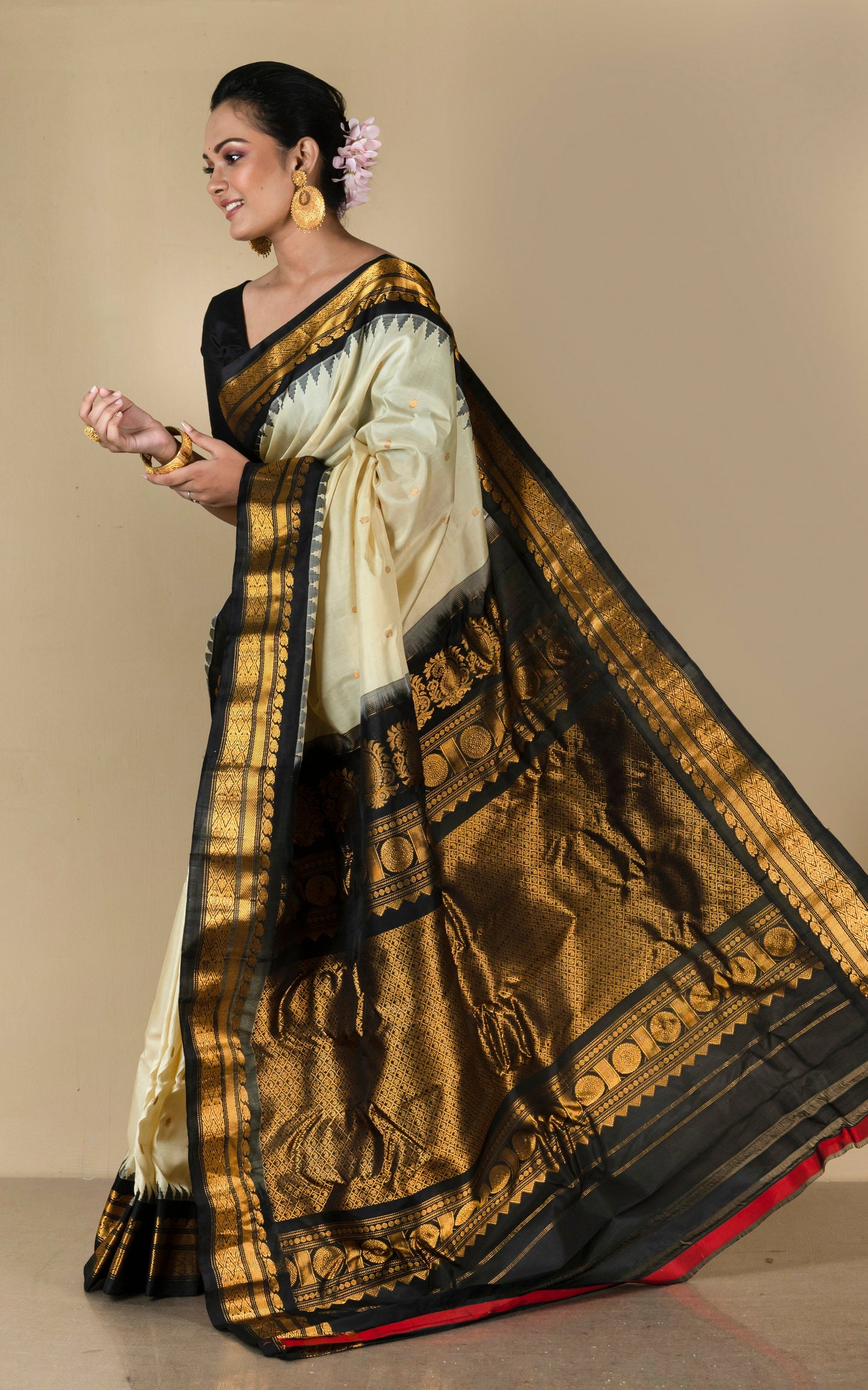 Handwoven Exclusive Gadwal Silk Saree in Off White, Zed Black and Golden Zari Work