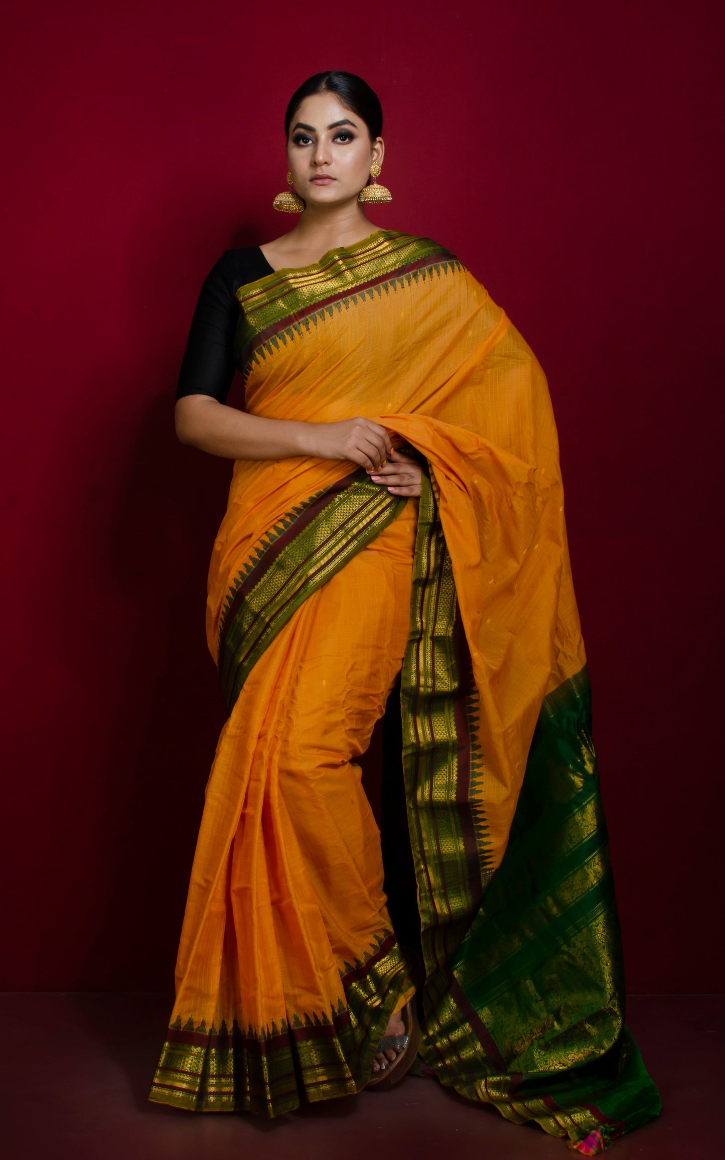 Exclusive Gadwal Seiko Silk Saree in Sunset Yellow, Green and Dark Brown