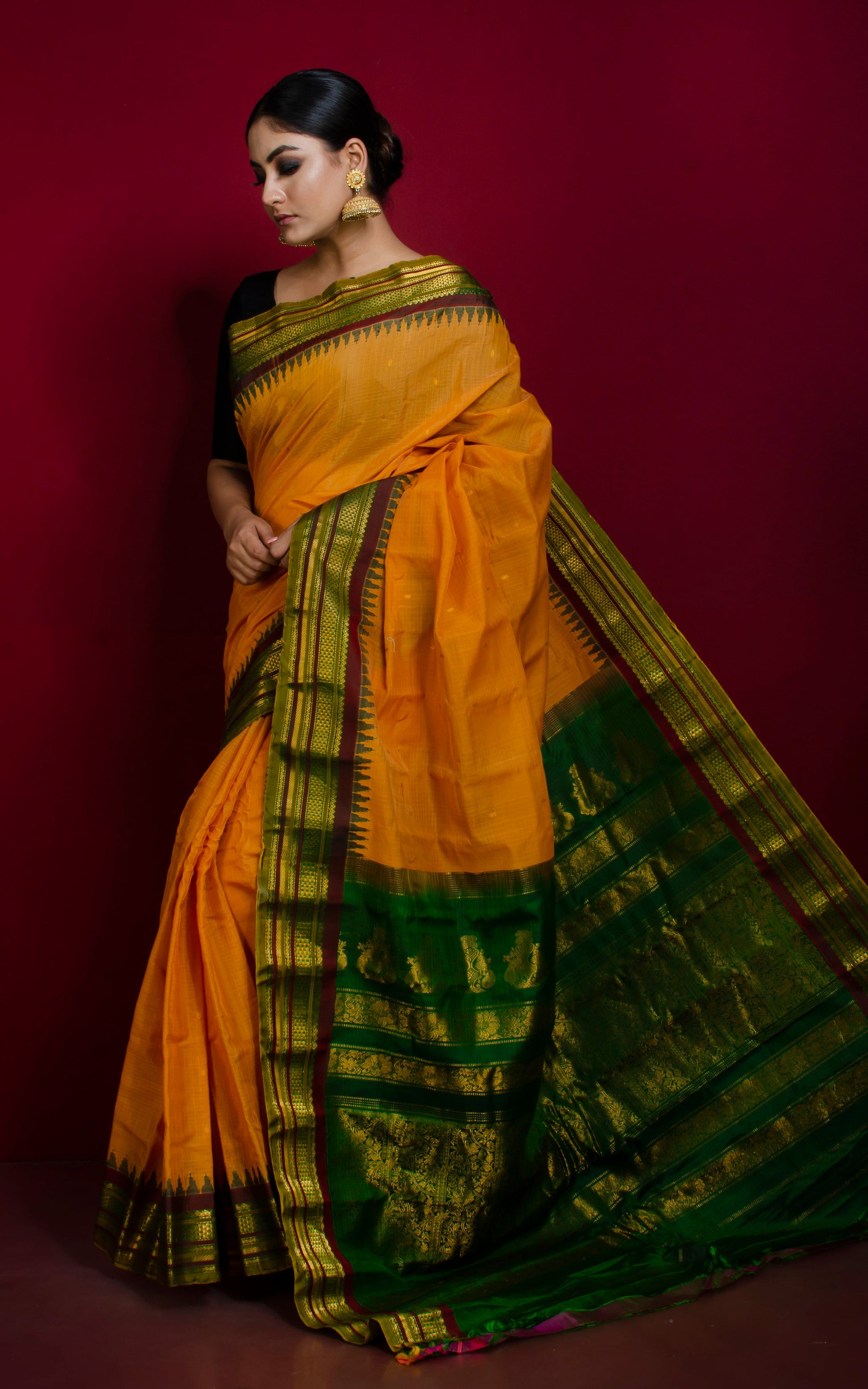 Exclusive Gadwal Seiko Silk Saree in Sunset Yellow, Green and Dark Brown