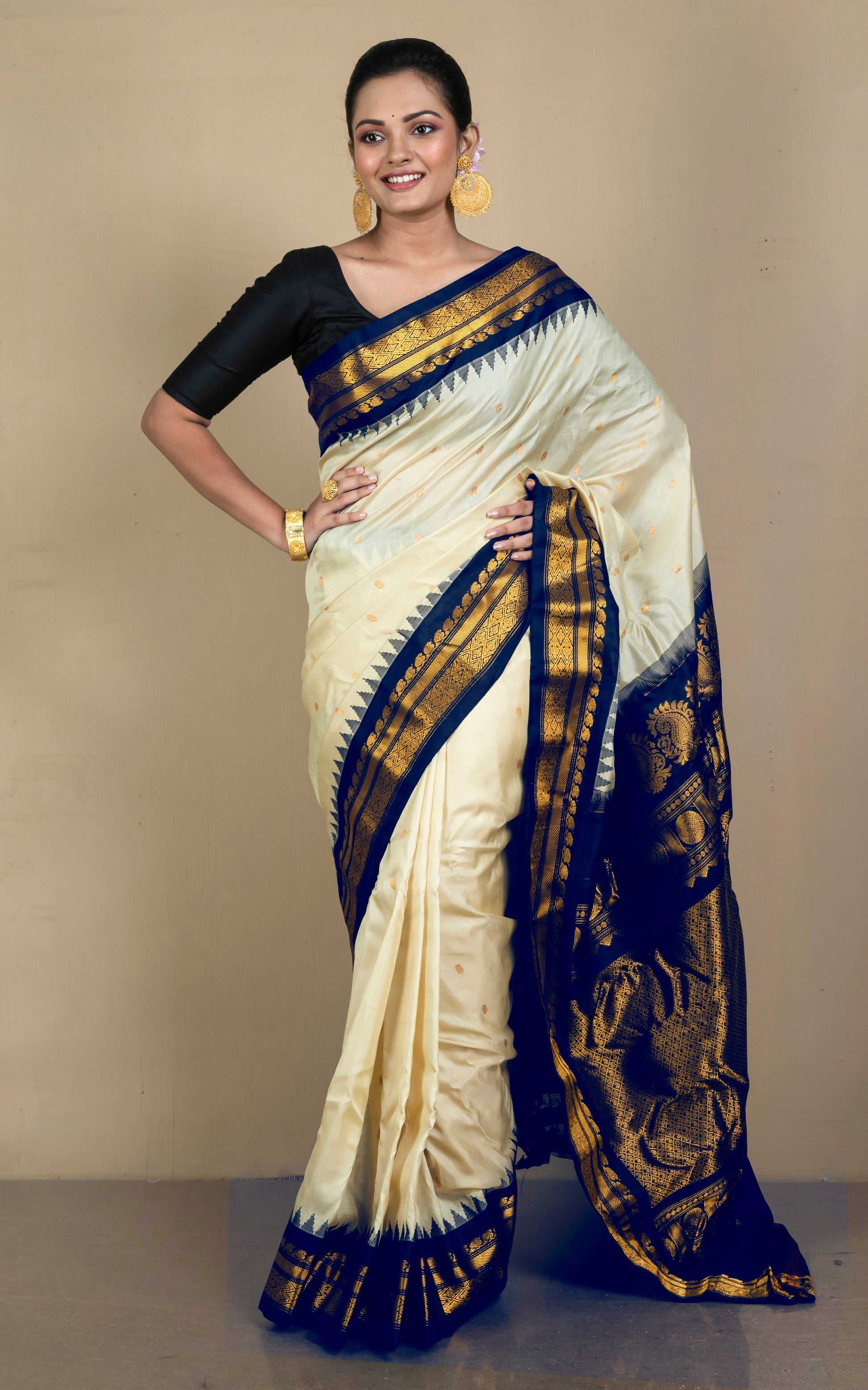 Handwoven Exclusive Gadwal Silk Saree in Off White, Navy Blue and Golden Zari Work