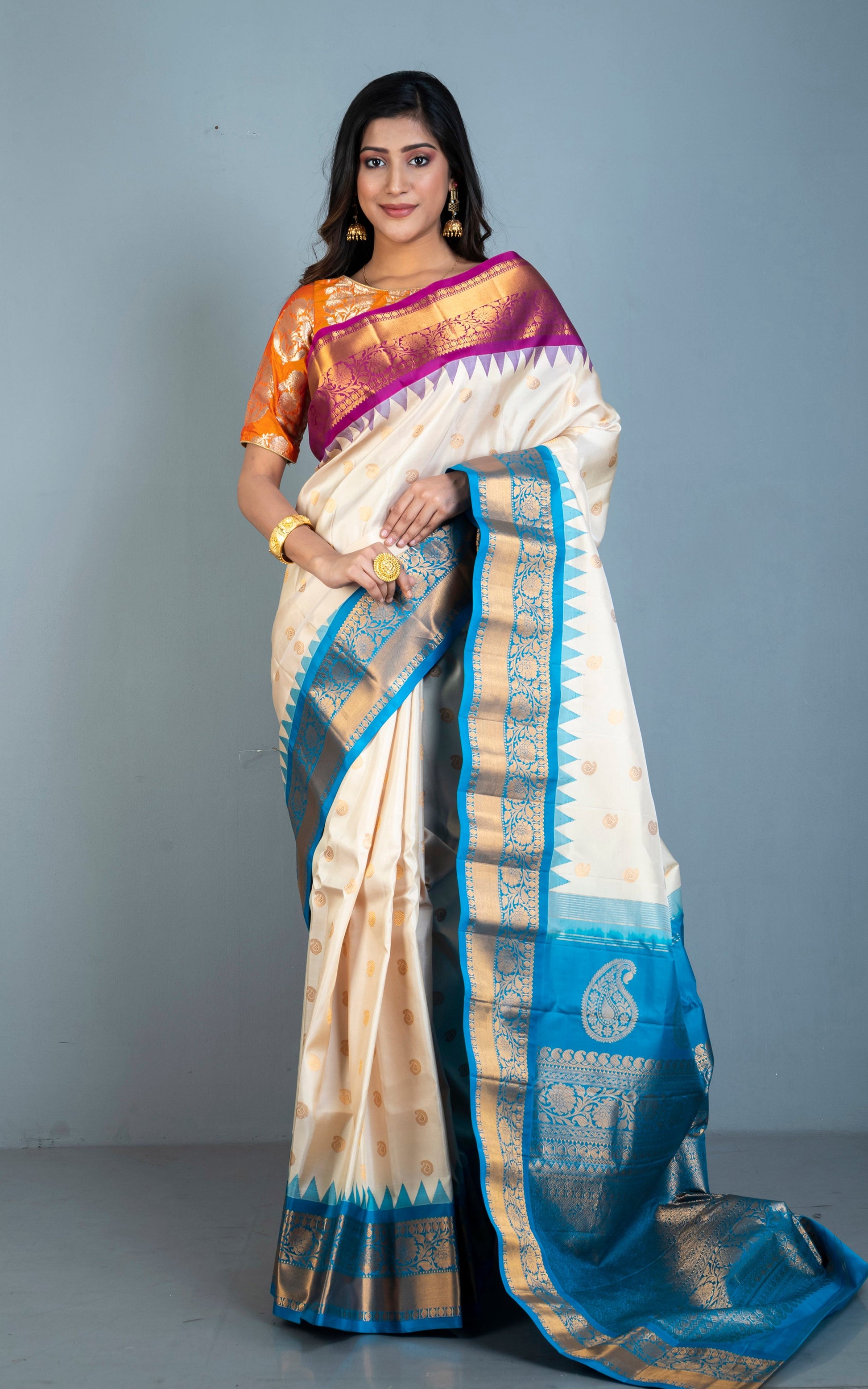 Exclusive Gadwal Silk Saree in Light Beige, Purple, Azure Blue and Golden Zari Weave