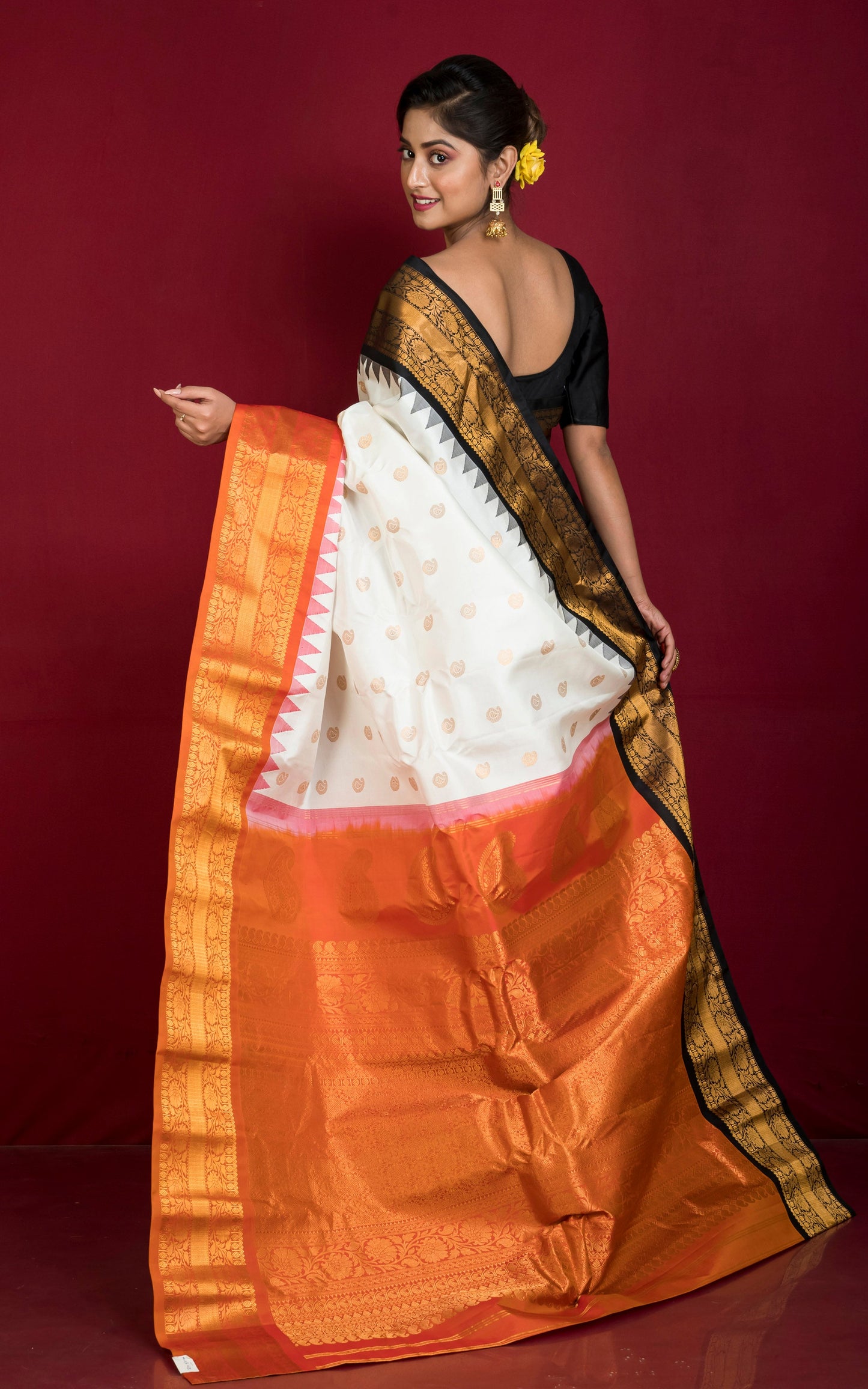 Exclusive Gadwal Silk Saree in Off White, Black, Burnt Orange and Golden Zari Weave