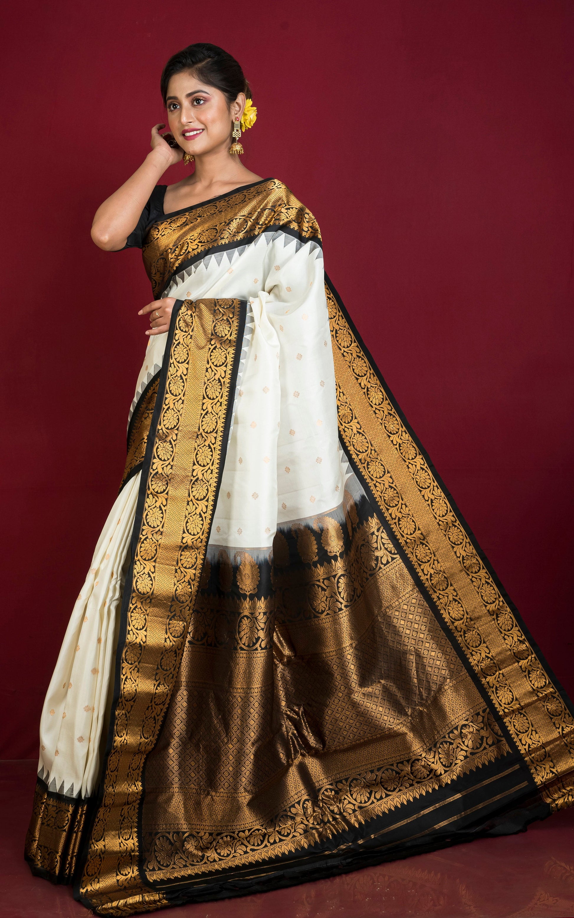 Handwoven Exclusive Gadwal Silk Saree in Off White, Black and Golden Zari Work