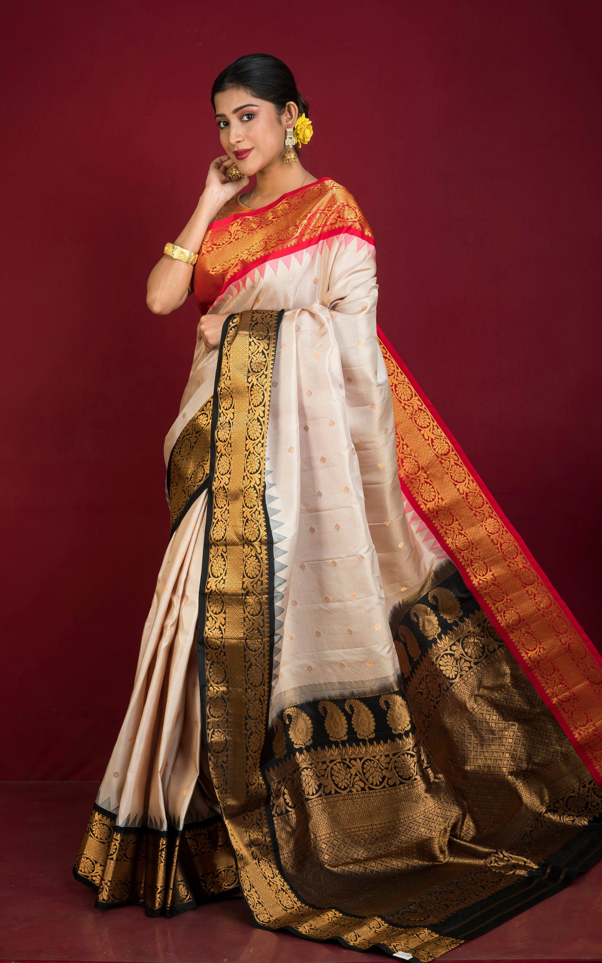 Exclusive Gadwal Silk Saree in Champagne, Red, Black and Golden Zari Weave