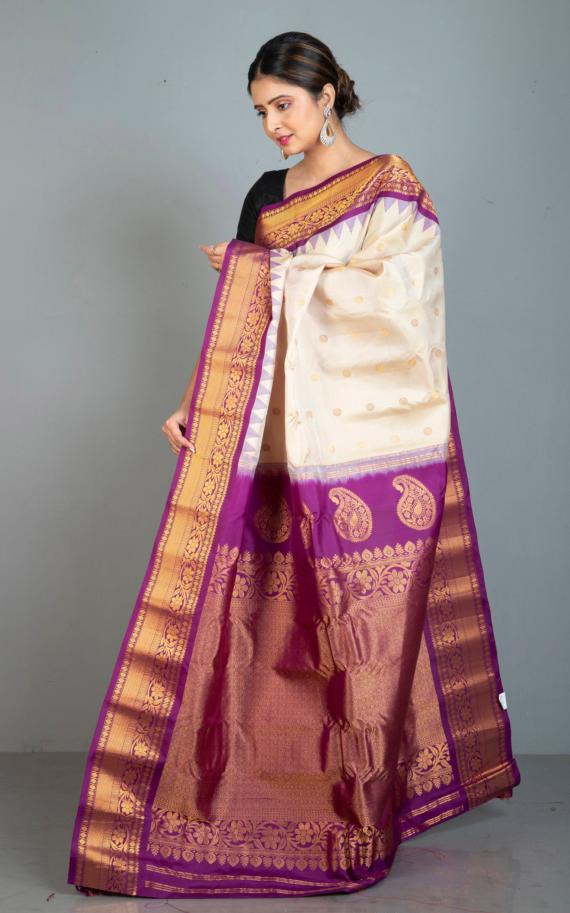 Handwoven Exclusive Gadwal Silk Saree in Beige, Purple and Golden Zari Work