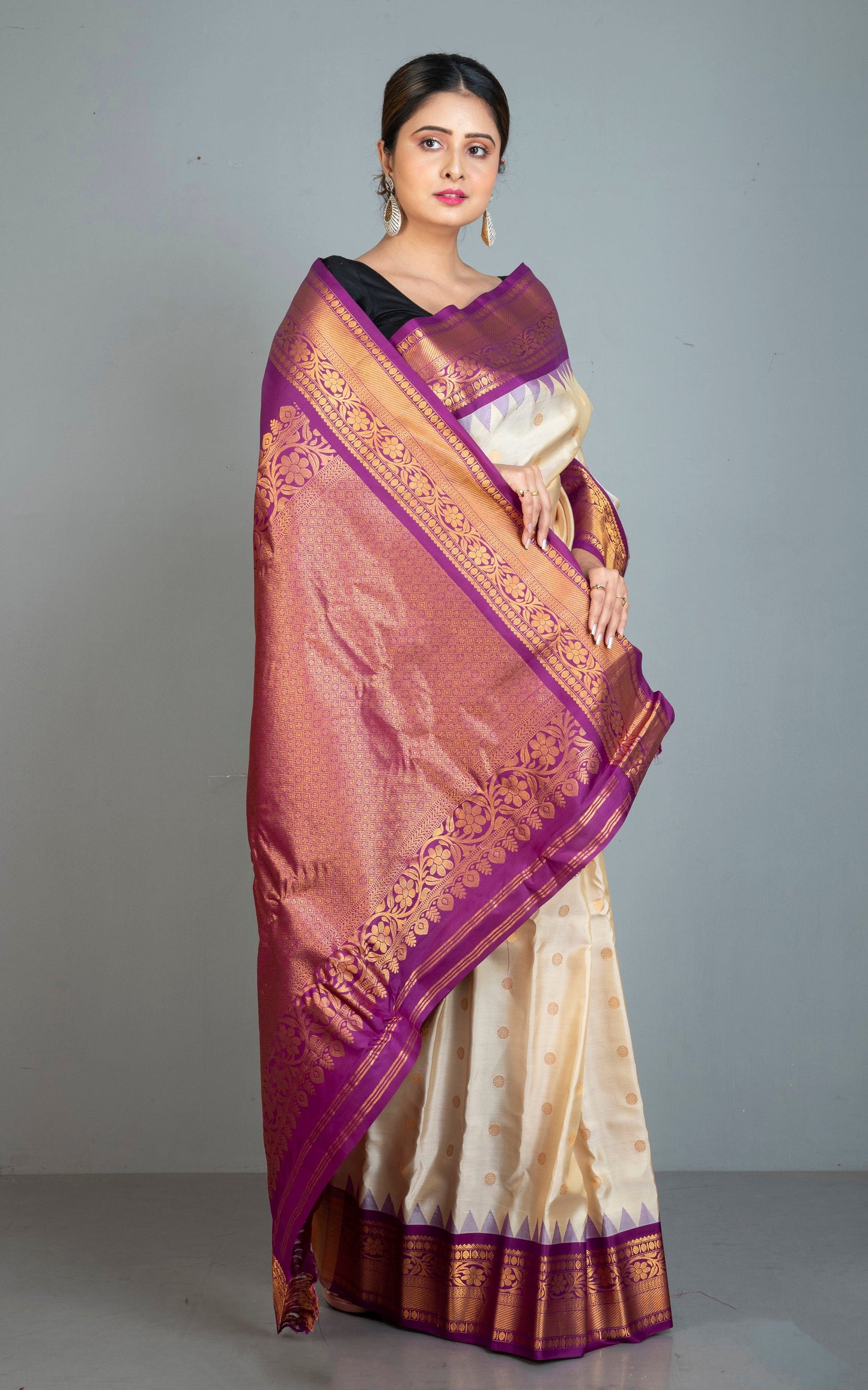 Handwoven Exclusive Gadwal Silk Saree in Beige, Purple and Golden Zari Work