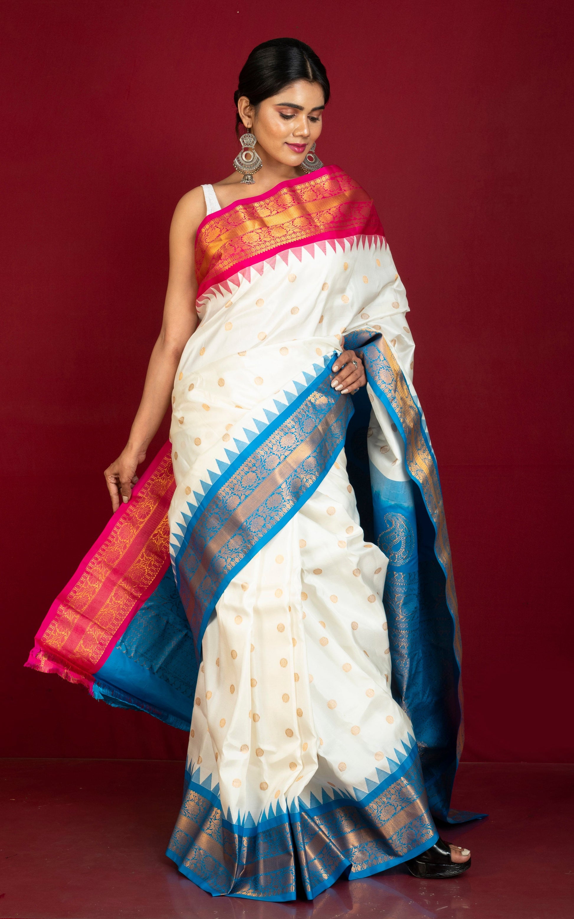 Exclusive Gadwal Silk Saree in Off White, Hot Pink, Azure Blue and Golden Zari Weave