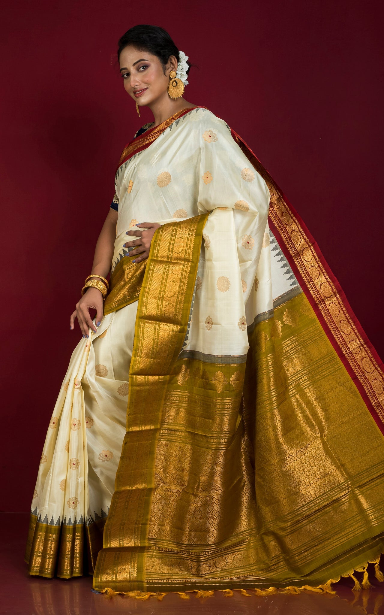 Exclusive Woven Ganja Jamuna Border Gadwal Silk Saree in Off White, Maroon, Henna Green and Golden Zari Weave