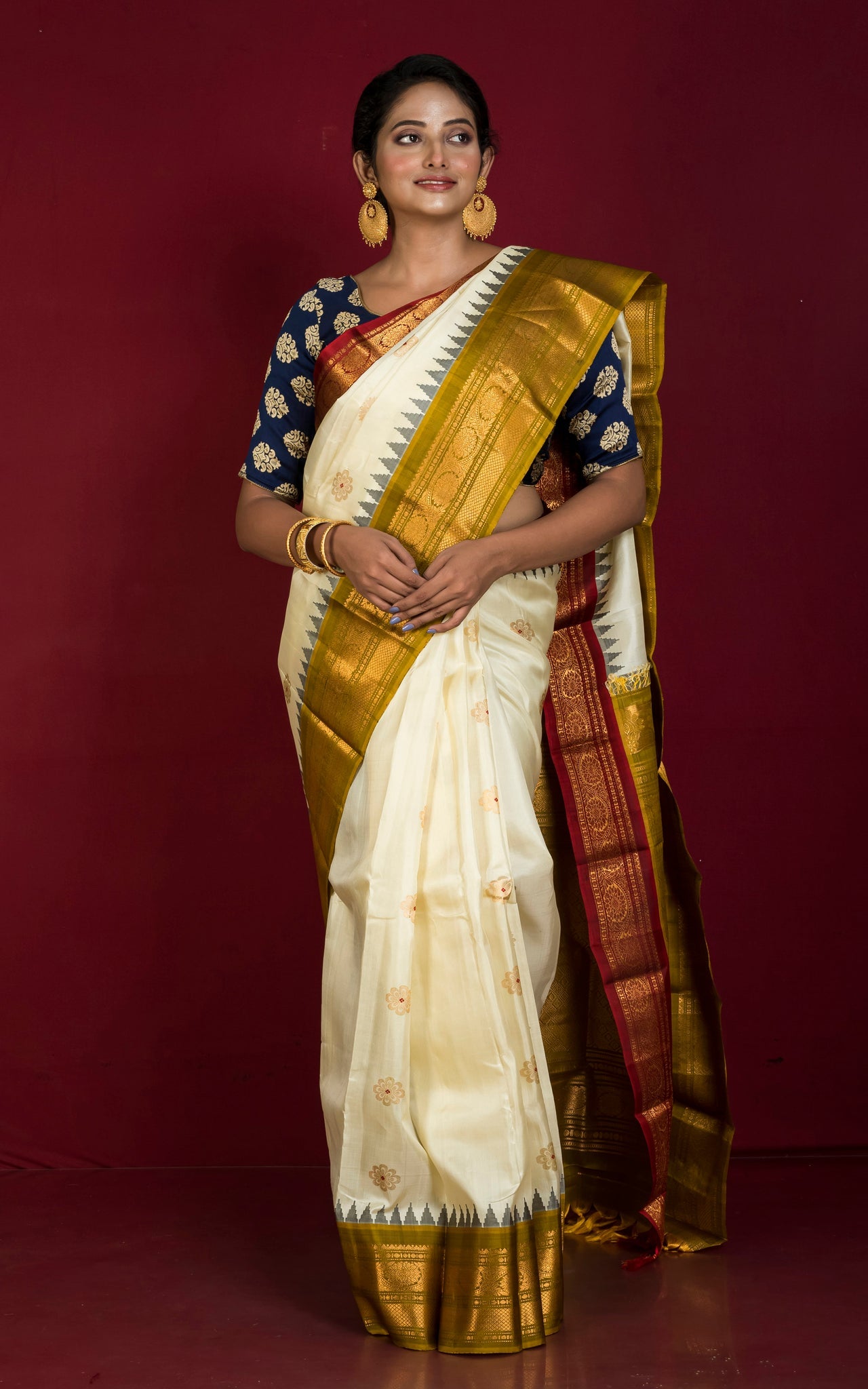 Exclusive Woven Ganja Jamuna Border Gadwal Silk Saree in Off White, Maroon, Henna Green and Golden Zari Weave