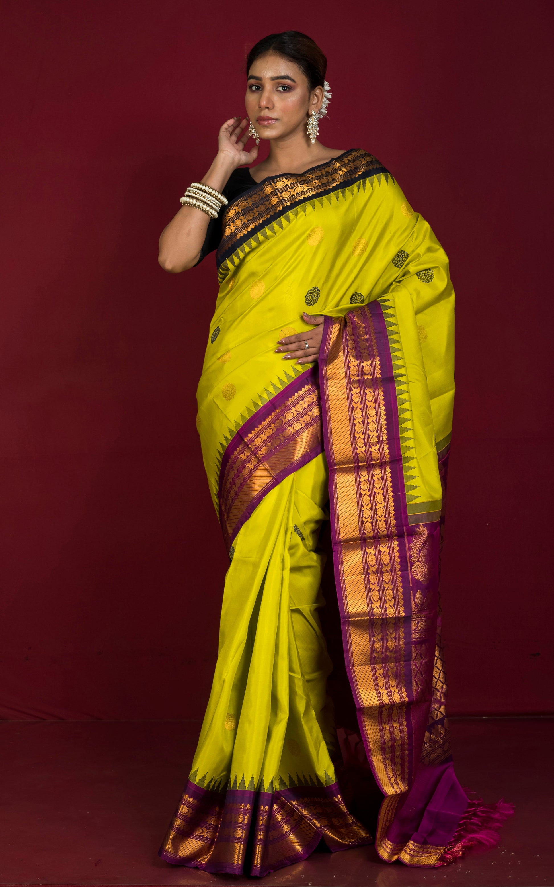 Exclusive Woven Ganja Jamuna Border Gadwal Silk Saree in Vibrant Green, Black, Purple and Golden Zari Weave