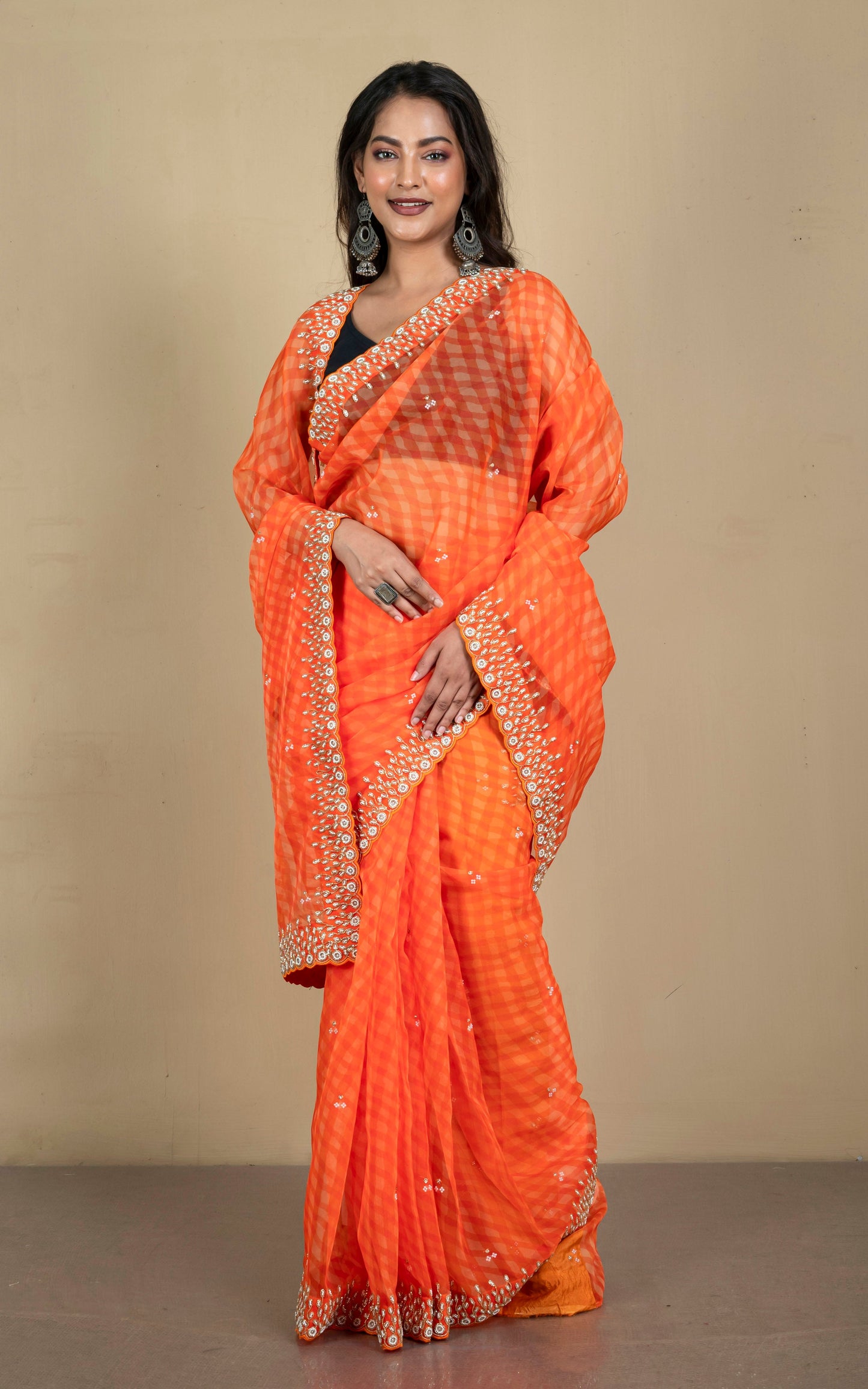 Bold and Fashionable Soft Organza Zardozi Silk Saree in Orange and Beige