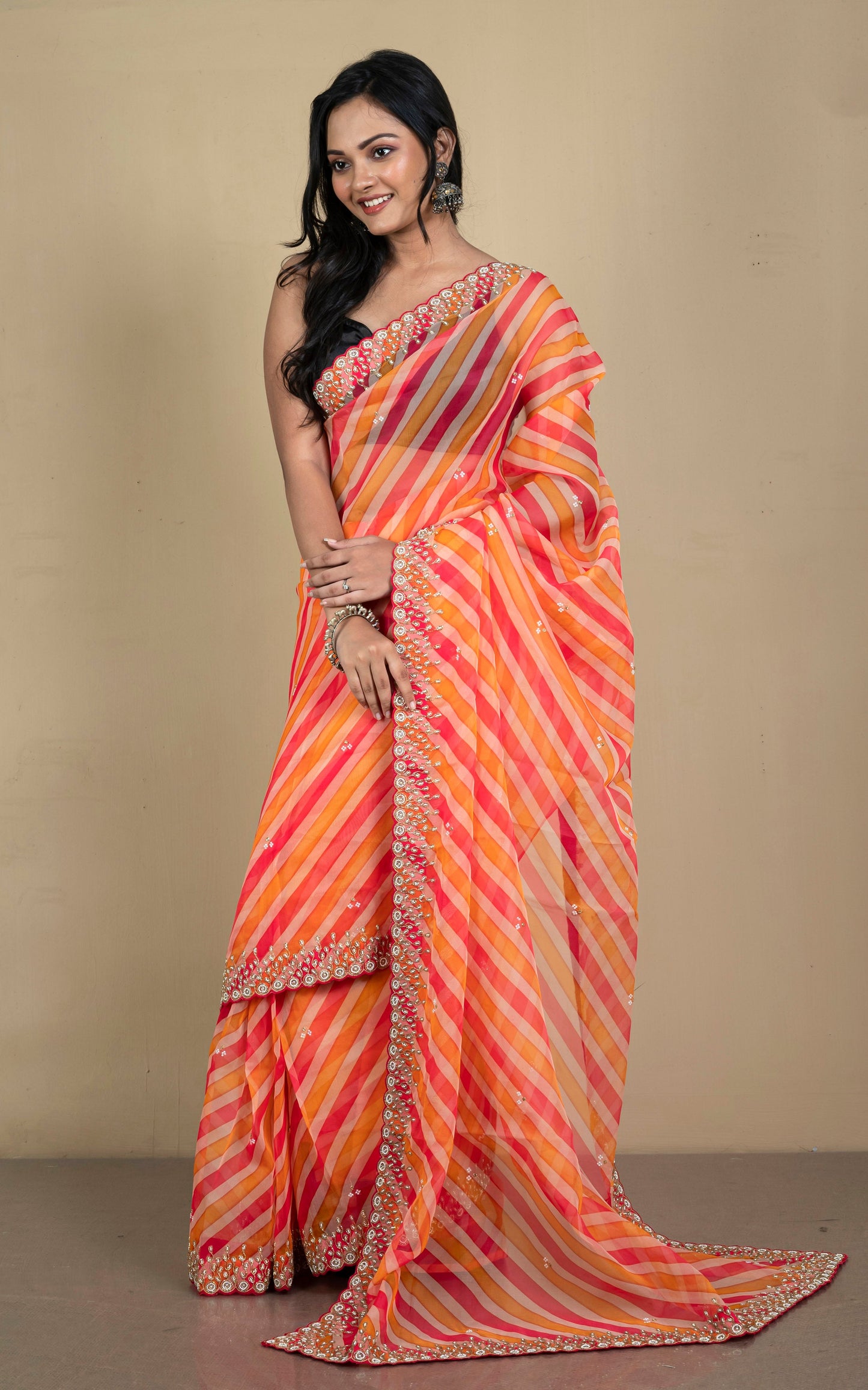 Bold and Fashionable Soft Organza Zardozi Silk Saree in Dual Tone Orange, Peach and Beige