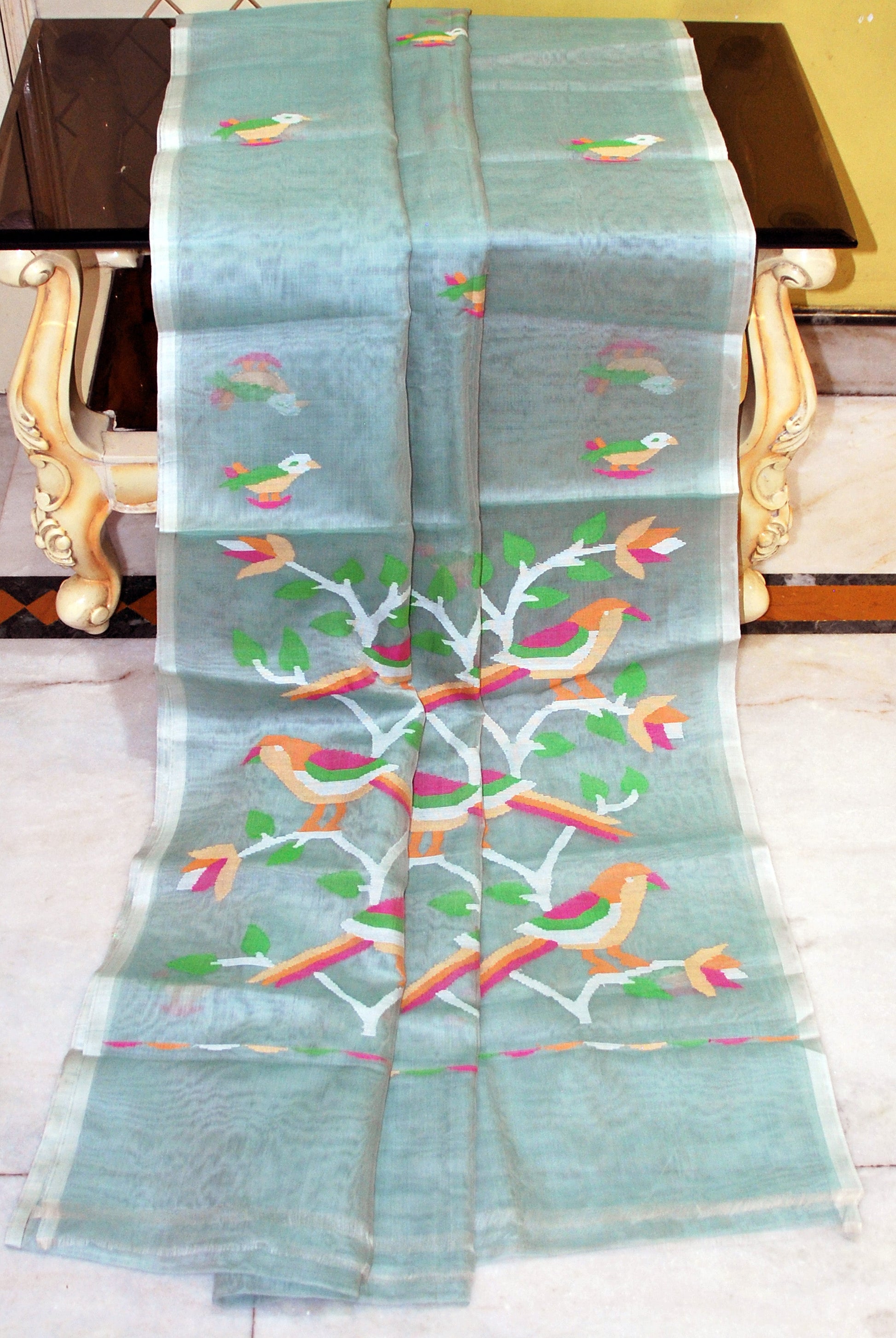 Muniya Woven Motif Silk Muslin Jamdani Saree in Water Green, Off White and Multicolored Thread Work