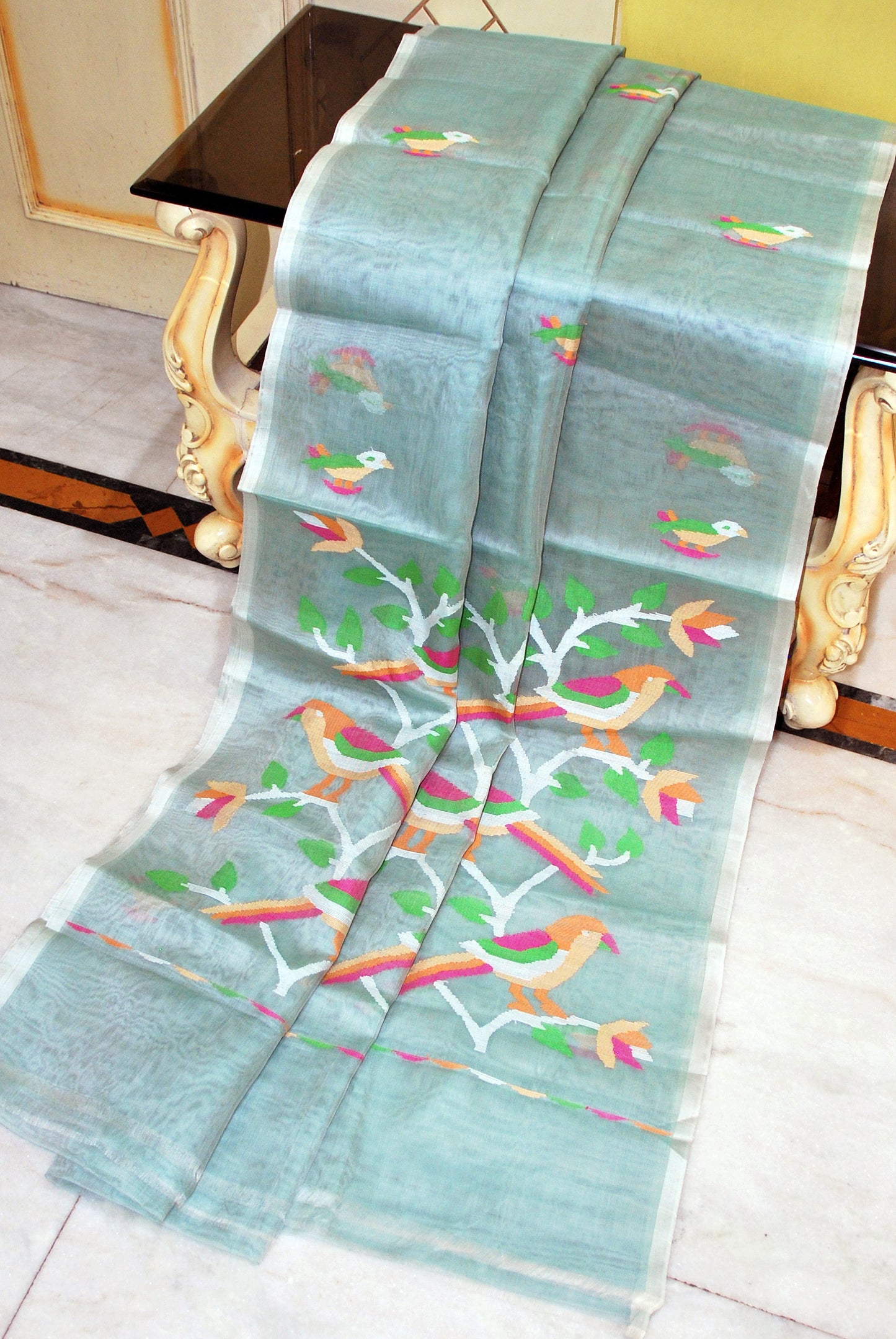 Muniya Woven Motif Silk Muslin Jamdani Saree in Water Green, Off White and Multicolored Thread Work