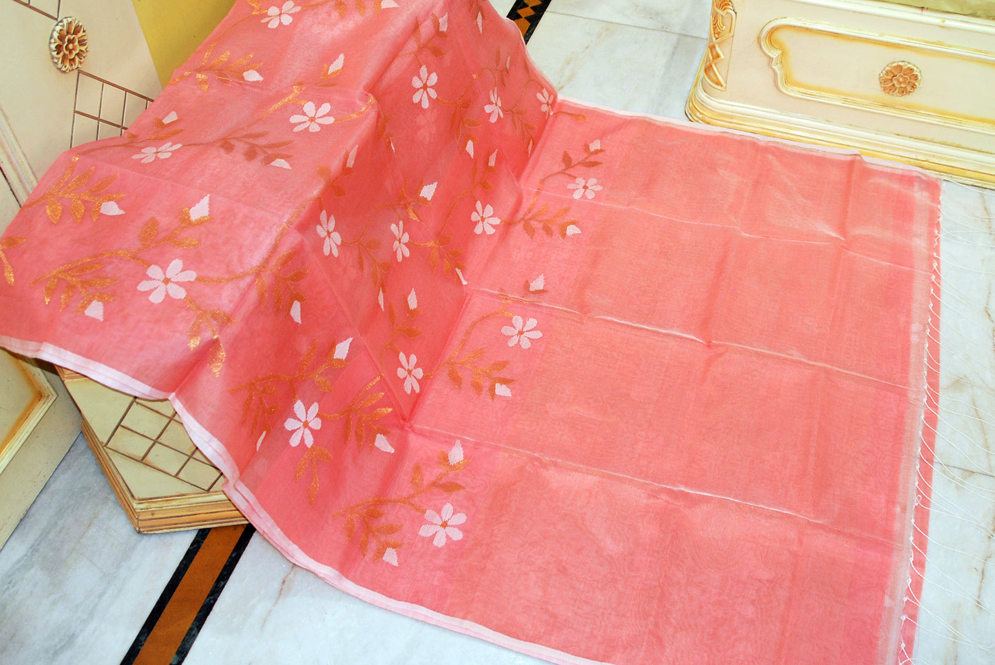 Premium Poth Muslin Silk Jamdani Saree with Jaal Floral Work in Candlelight Peach, Off White and Golden