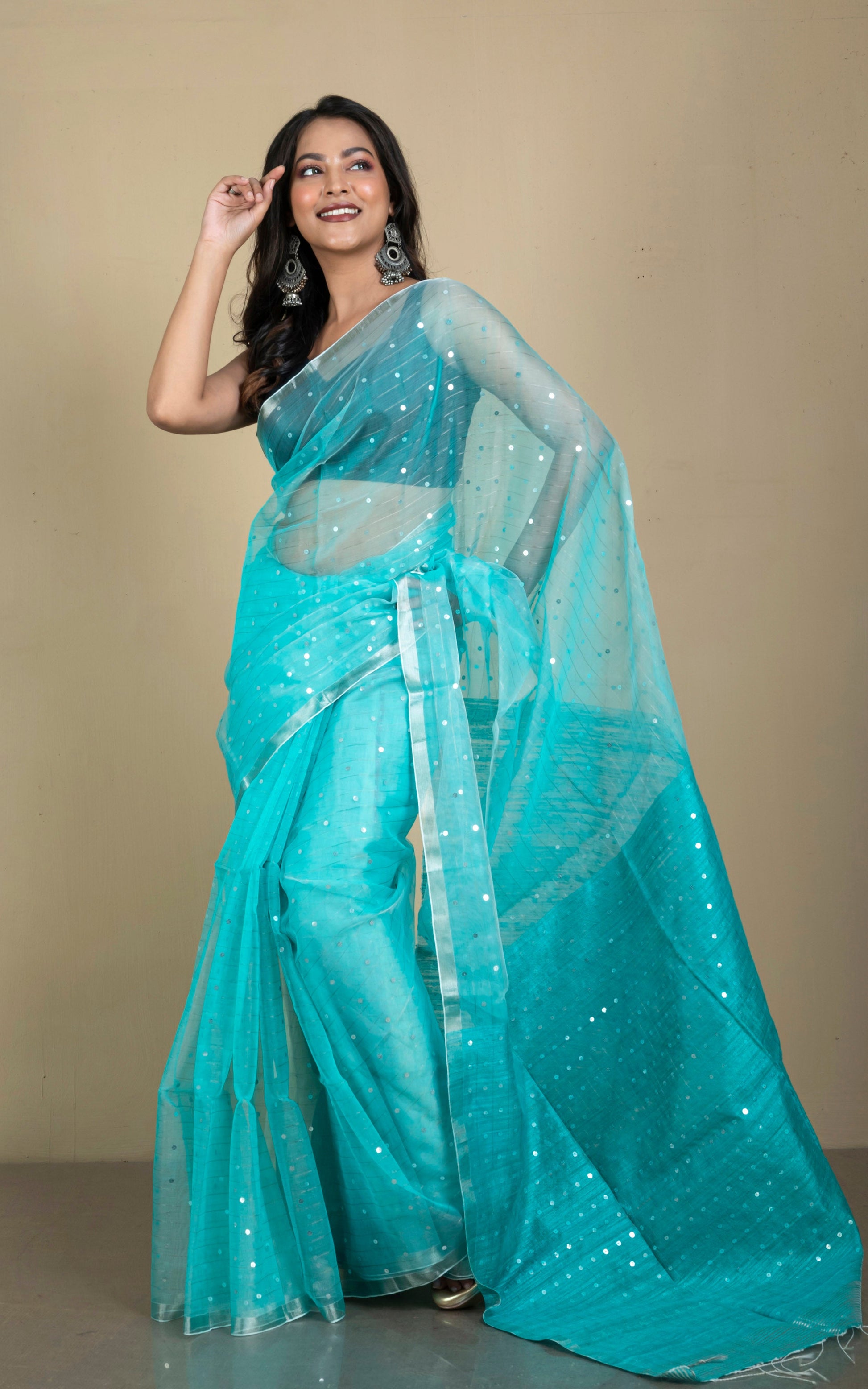 Sequin Inlaid Muslin Silk Saree with Raw Silk Pallu in Aqua Green and Silver