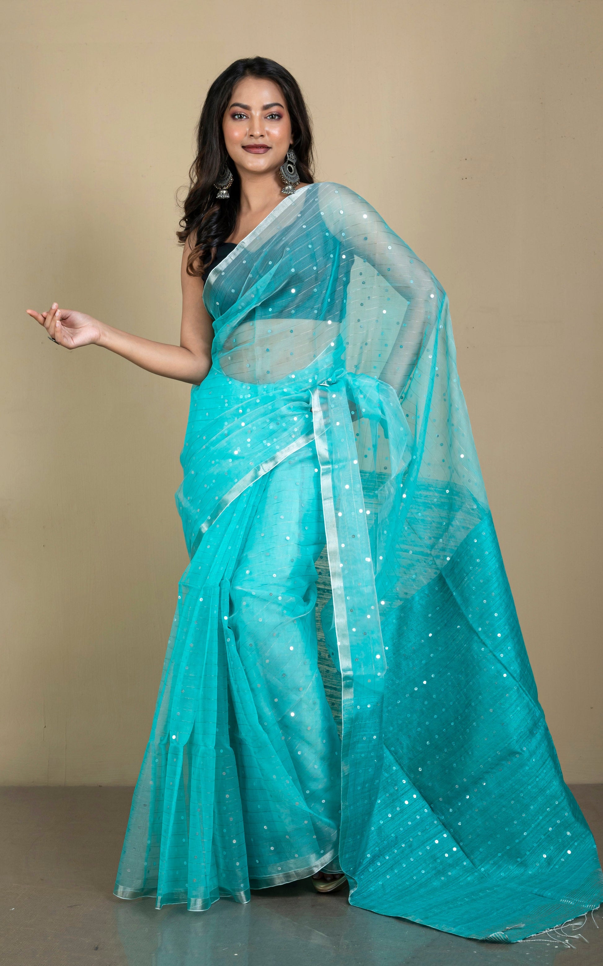 Sequin Inlaid Muslin Silk Saree with Raw Silk Pallu in Aqua Green and Silver