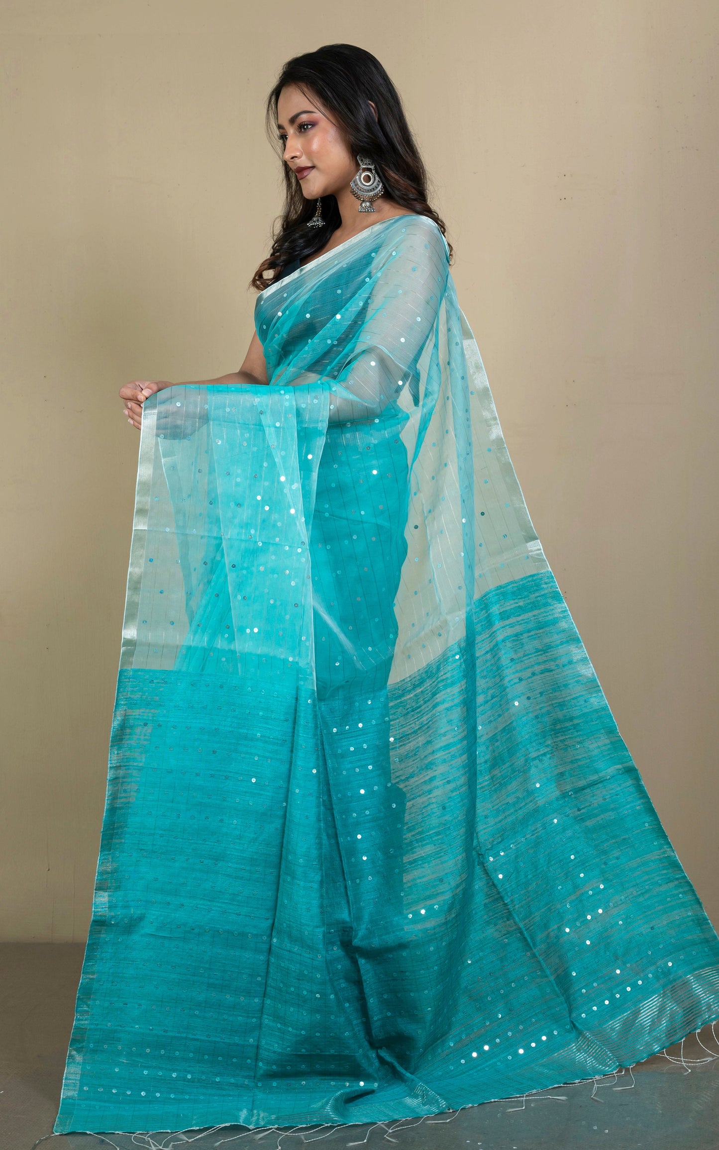 Sequin Inlaid Muslin Silk Saree with Raw Silk Pallu in Aqua Green and Silver