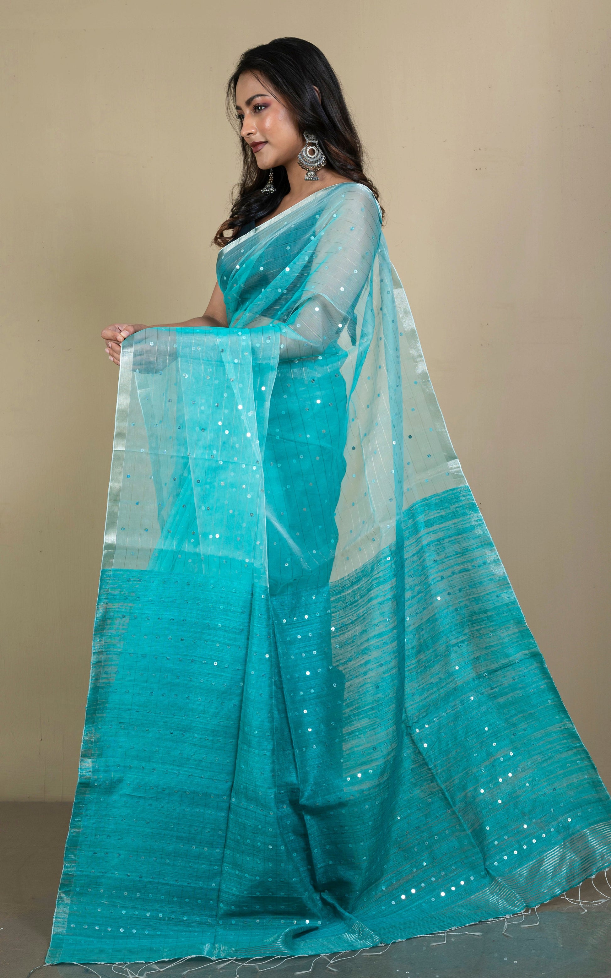 Sequin Inlaid Muslin Silk Saree with Raw Silk Pallu in Aqua Green and Silver