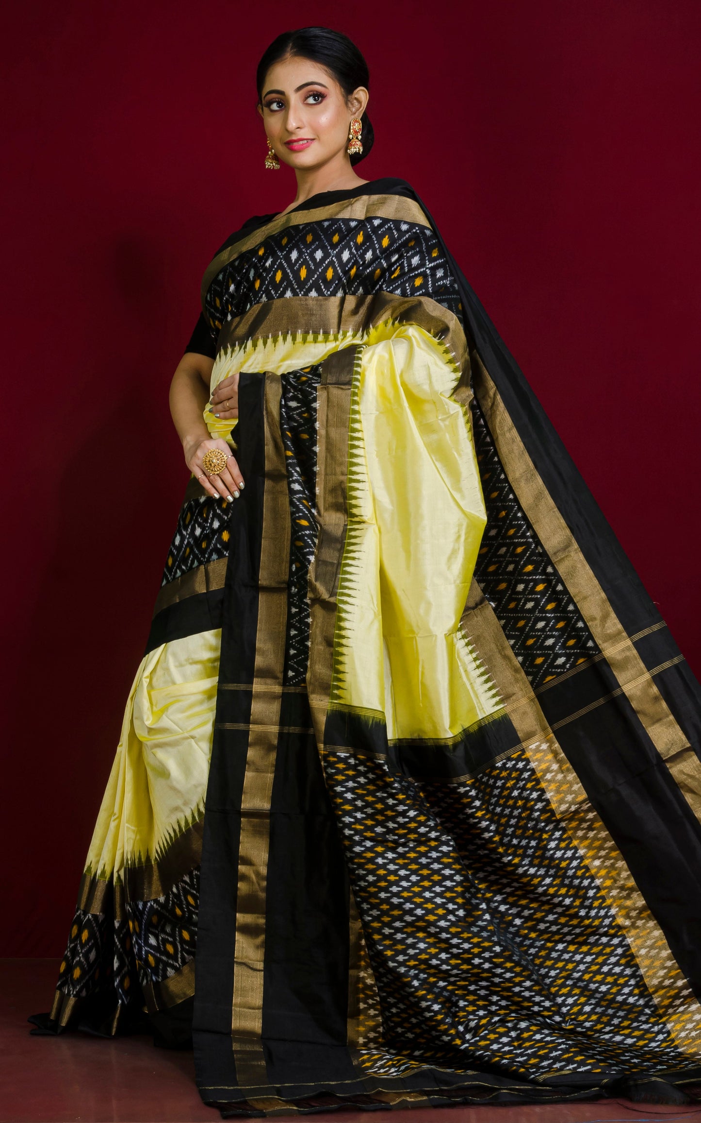 Designer Skirt Border Ikkat Pochampally Silk Saree in Cream, Black and Antique Gold