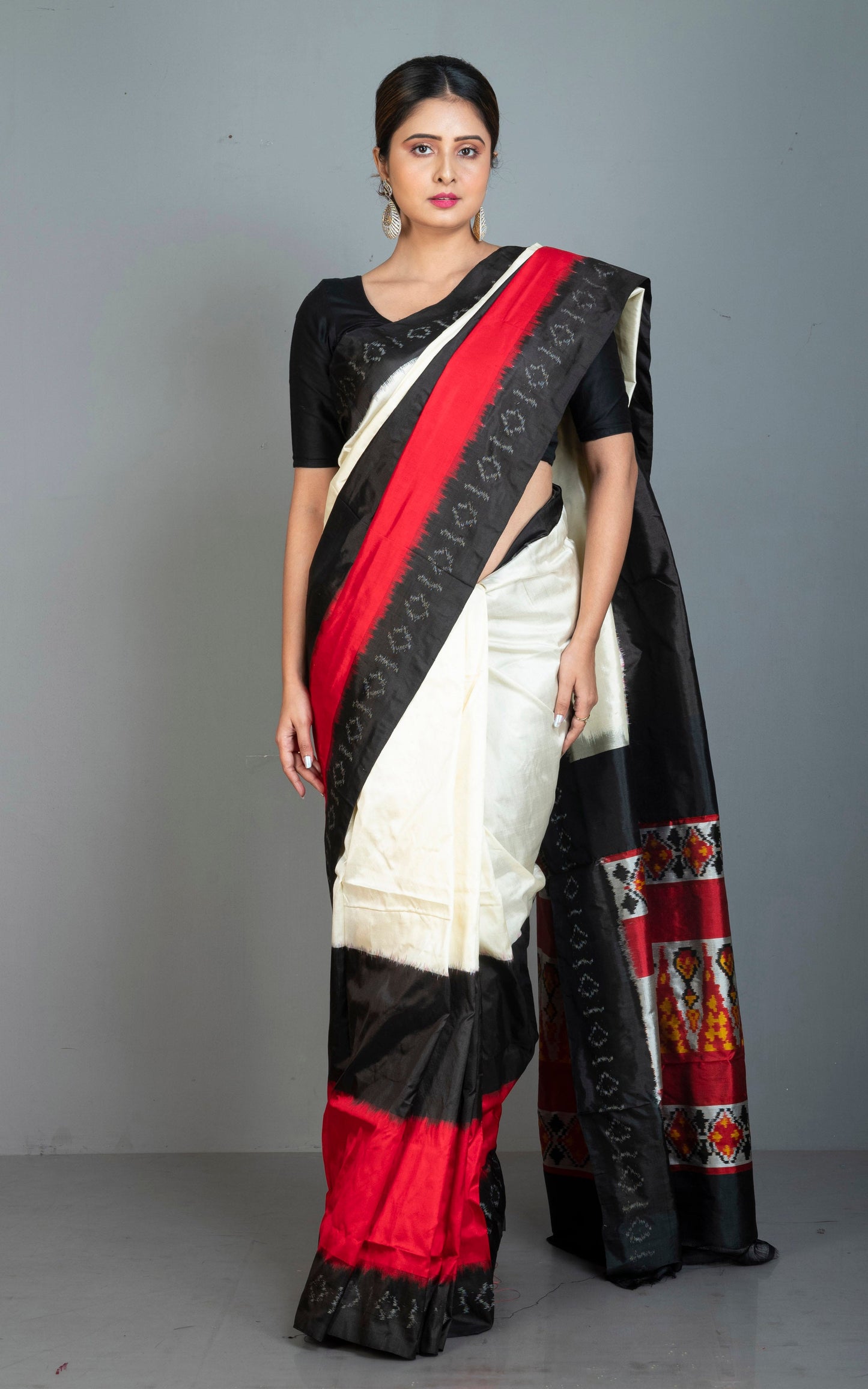 Handwoven Ikkat Pochampally Silk Saree in Off White, Black, Red and Amber