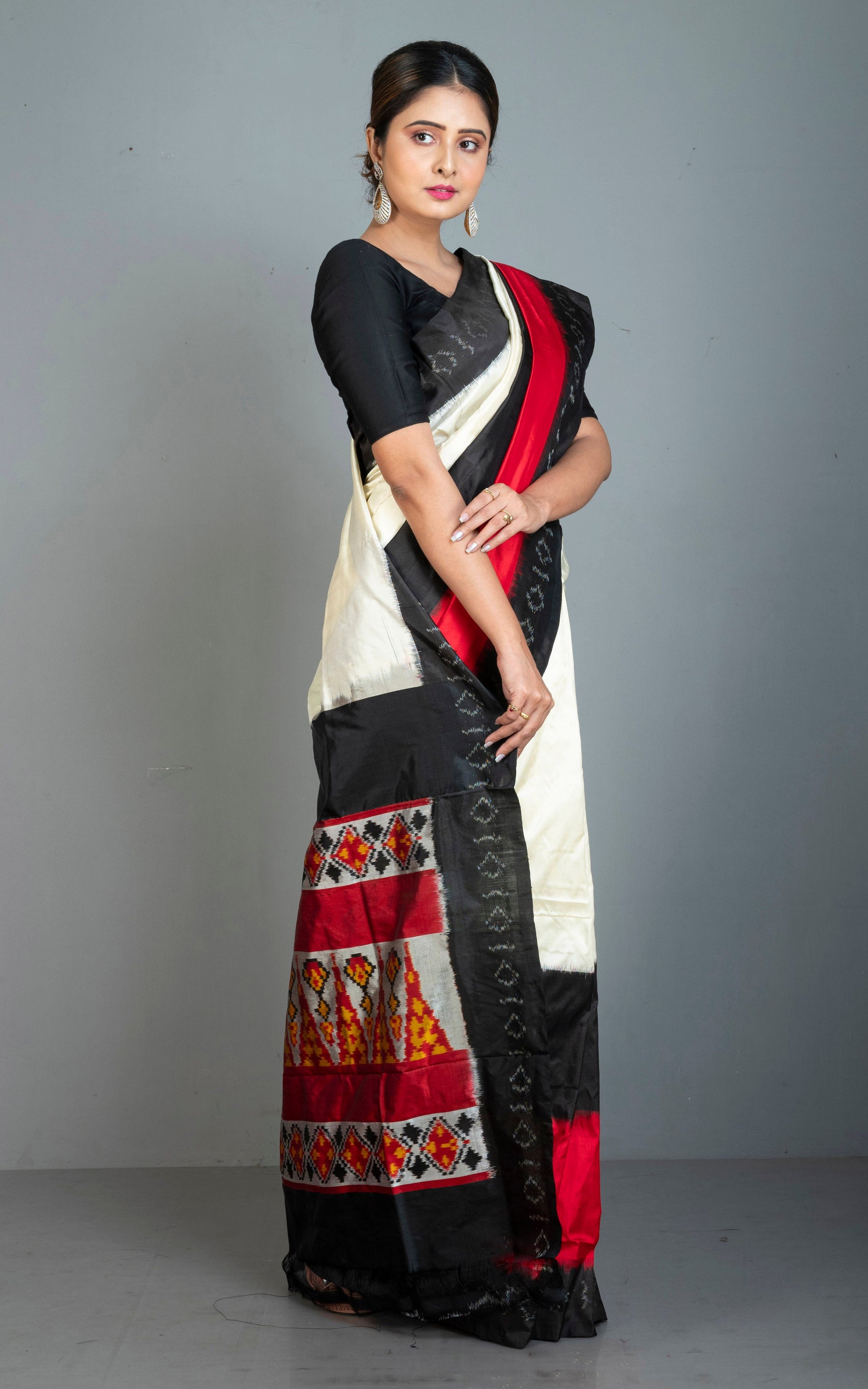 Handwoven Ikkat Pochampally Silk Saree in Off White, Black, Red and Amber