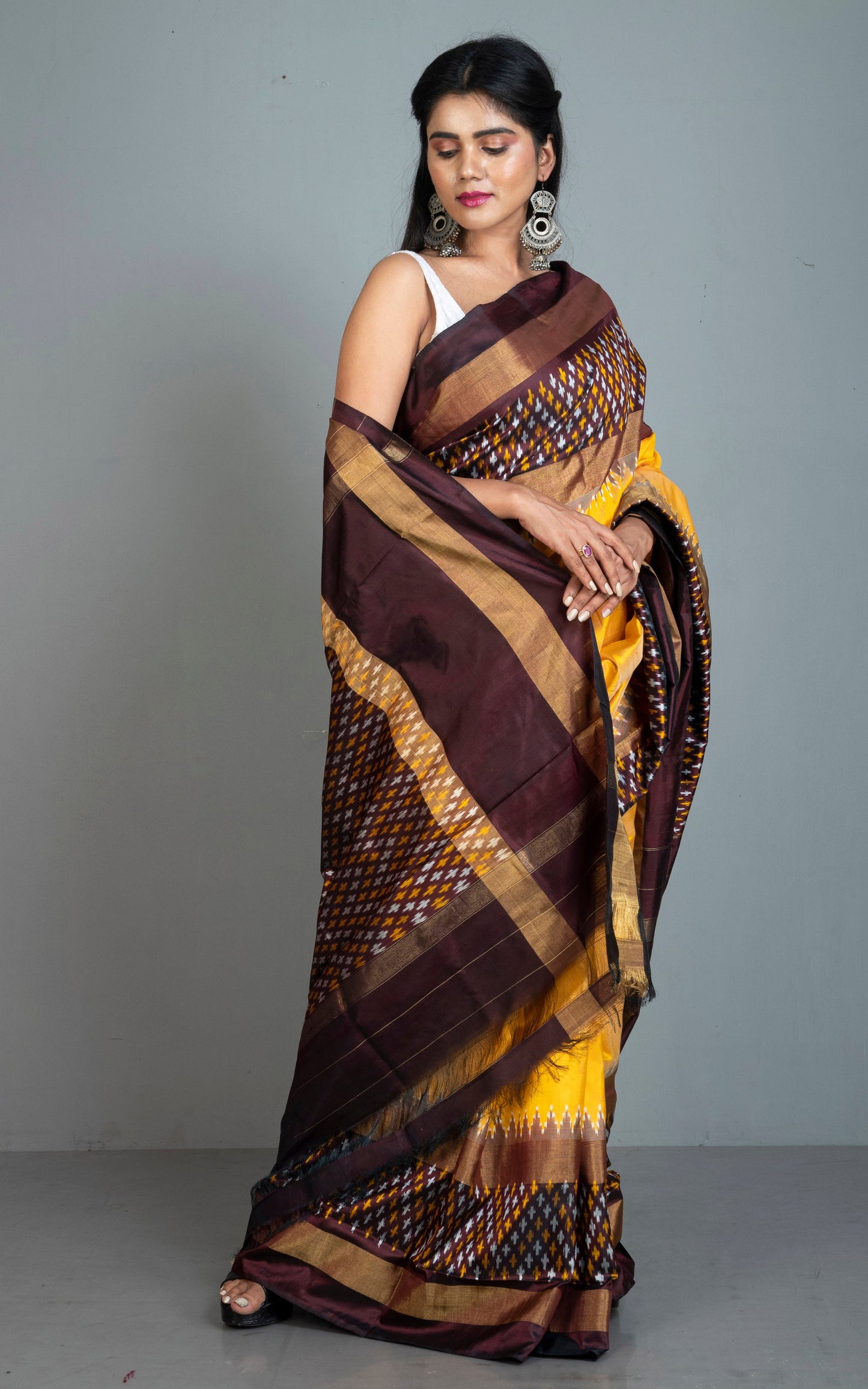 Designer Skirt Border Ikkat Pochampally Silk Saree in Yellow, Mahogany Brown and Silver White