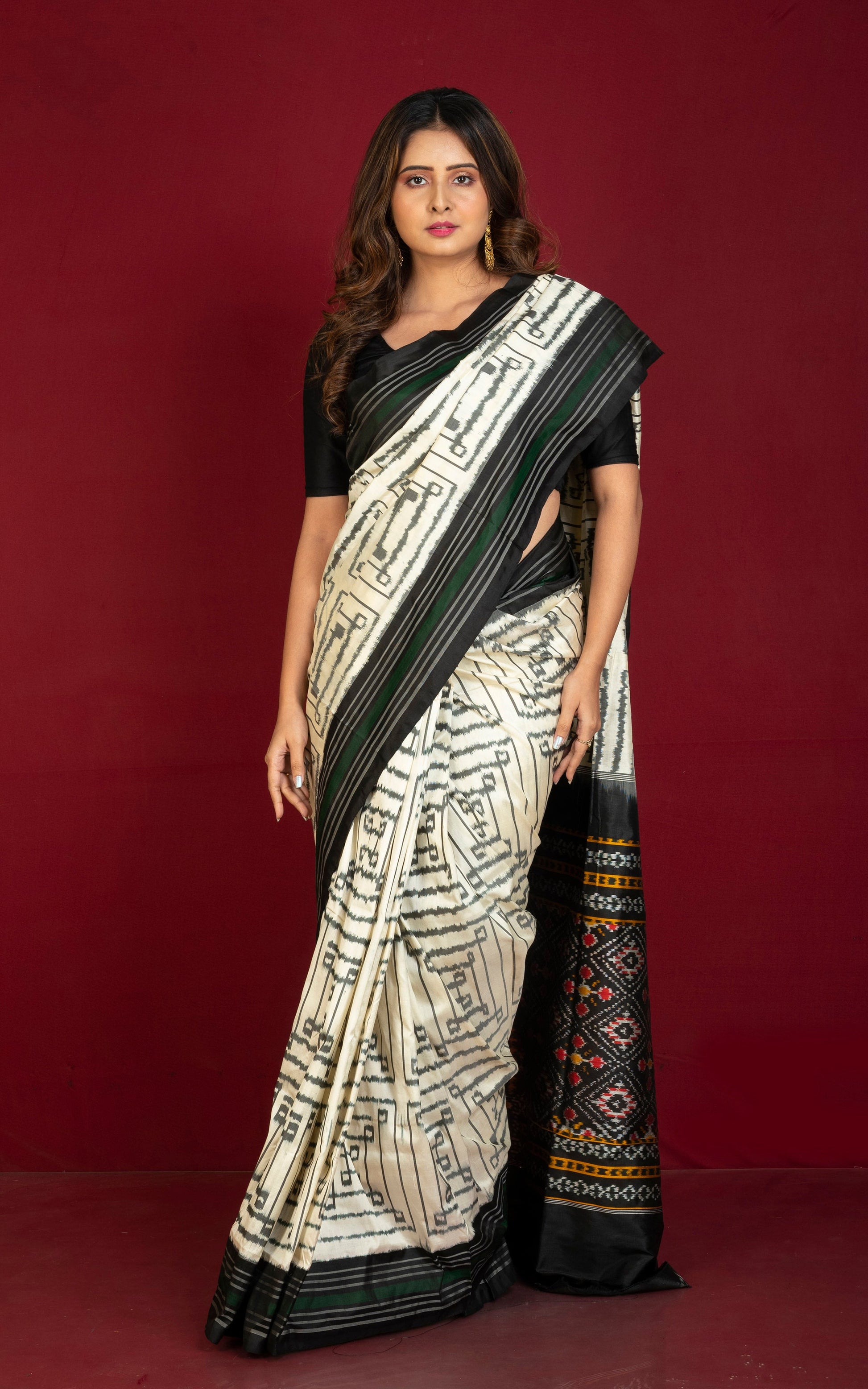 Exclusive Twill Ikkat Pochampally Silk Saree with Madhathasu Pallu in Off White, Black, Dark Green and Multicolored