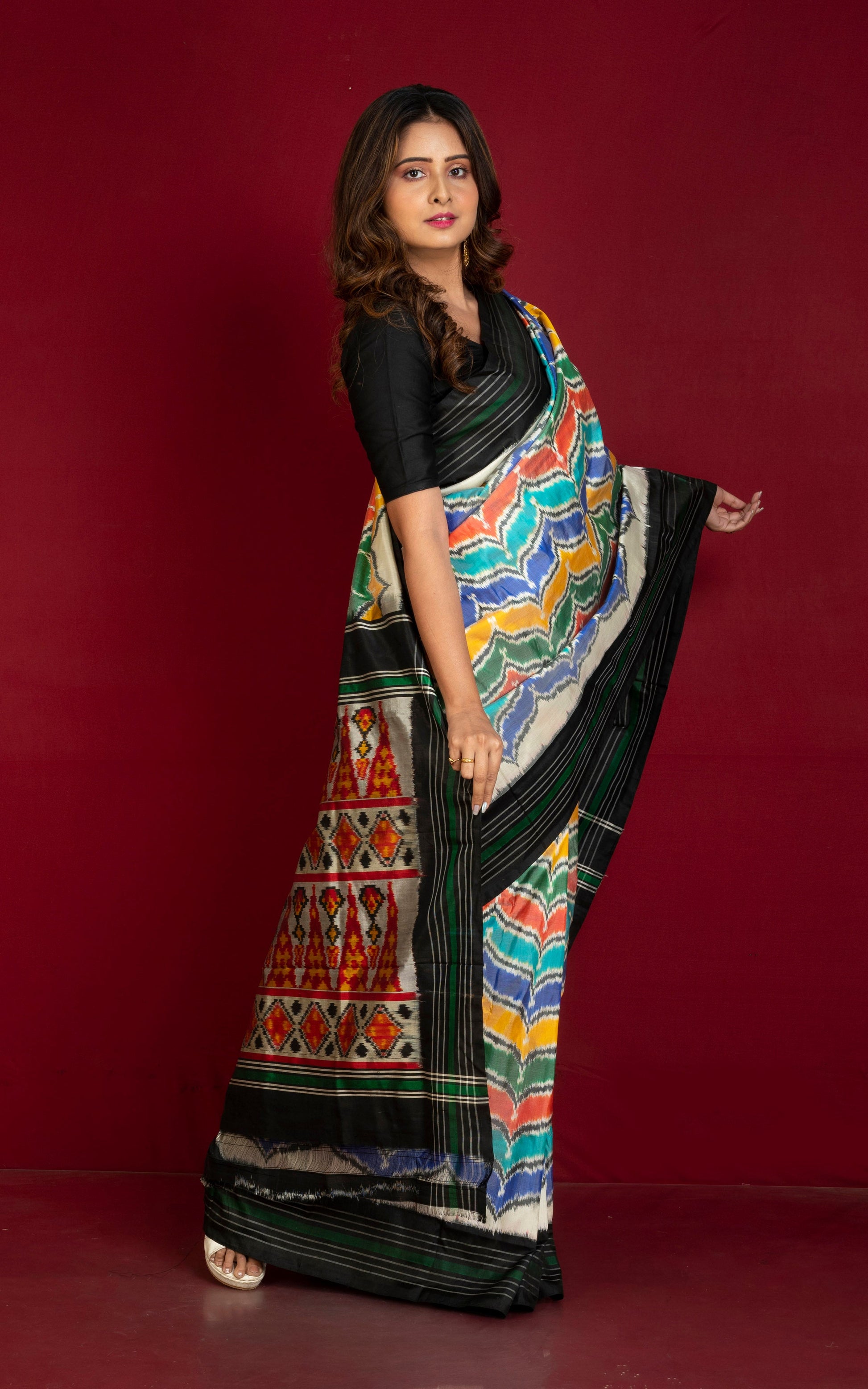 Handwoven Designer Rangkart Ikkat Pochampally Silk Saree in Off White, Black, Dark Green and Multicolored