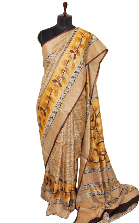 Designer Tussar Silk Saree in Beige, Ochre Yellow, Black and Dark Brown Prints embellished with Silver Zari Hand Embroidery Pitai Work