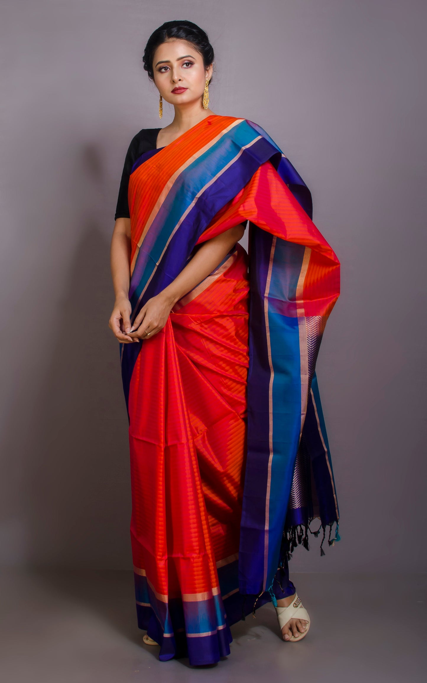 Soft Silk Metro Border Kanchipuram Silk Saree in Deep Peach, Electric Blue, Dark Blue and Brush Gold