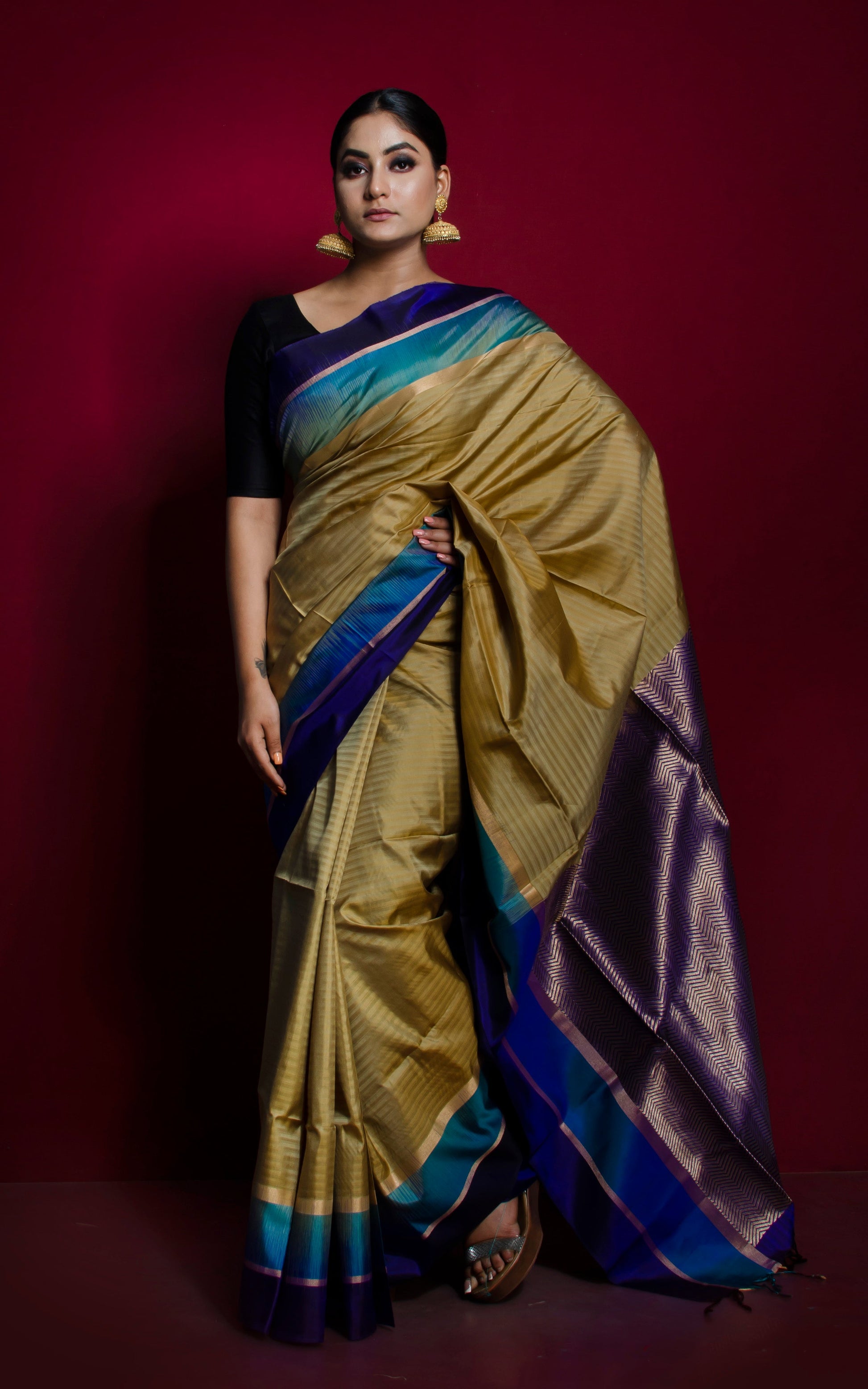 Soft Silk Metro Border Kanchipuram Silk Saree in Sand Gold, Cyan, Dark Blue and Brush Gold