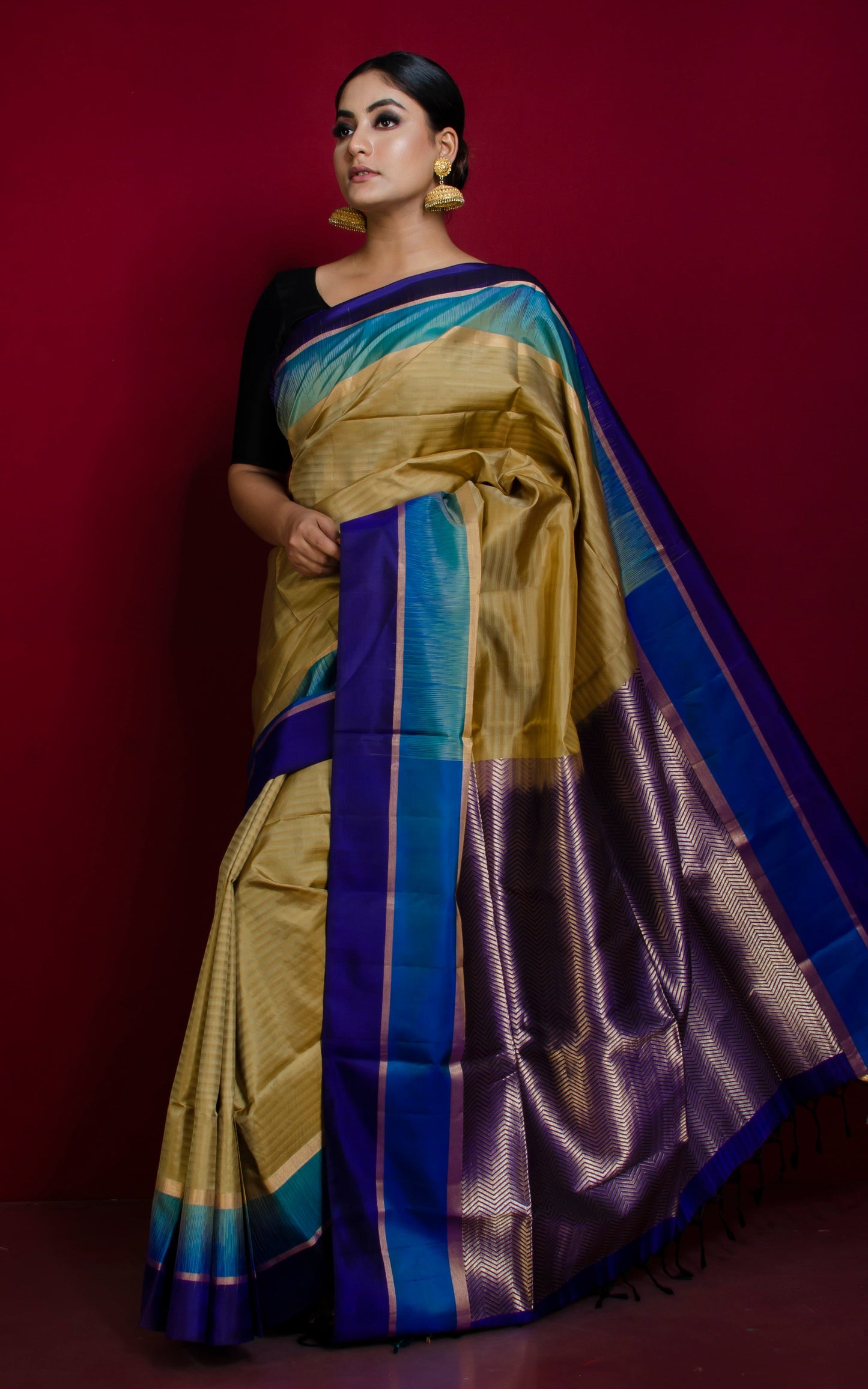 Soft Silk Metro Border Kanchipuram Silk Saree in Sand Gold, Cyan, Dark Blue and Brush Gold