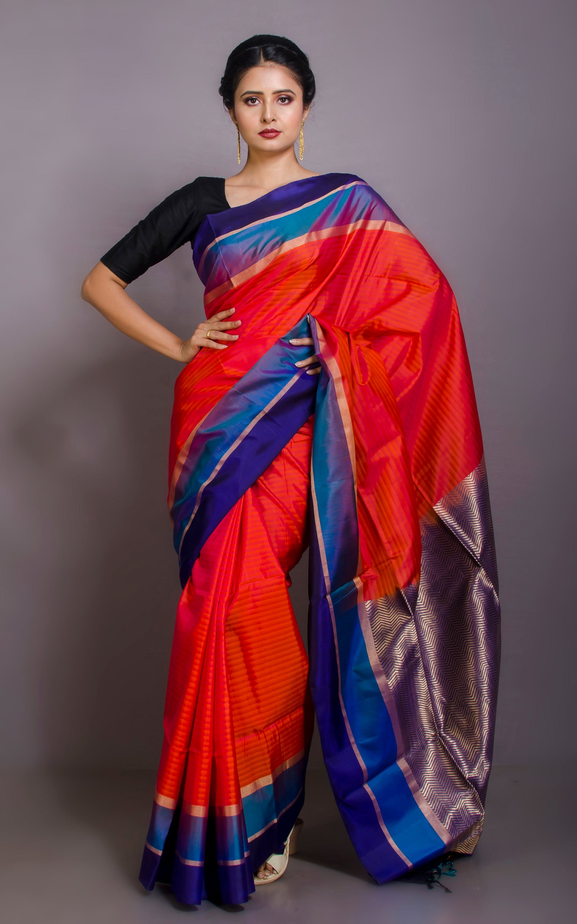 Soft Silk Metro Border Kanchipuram Silk Saree in Deep Peach, Electric Blue, Dark Blue and Brush Gold