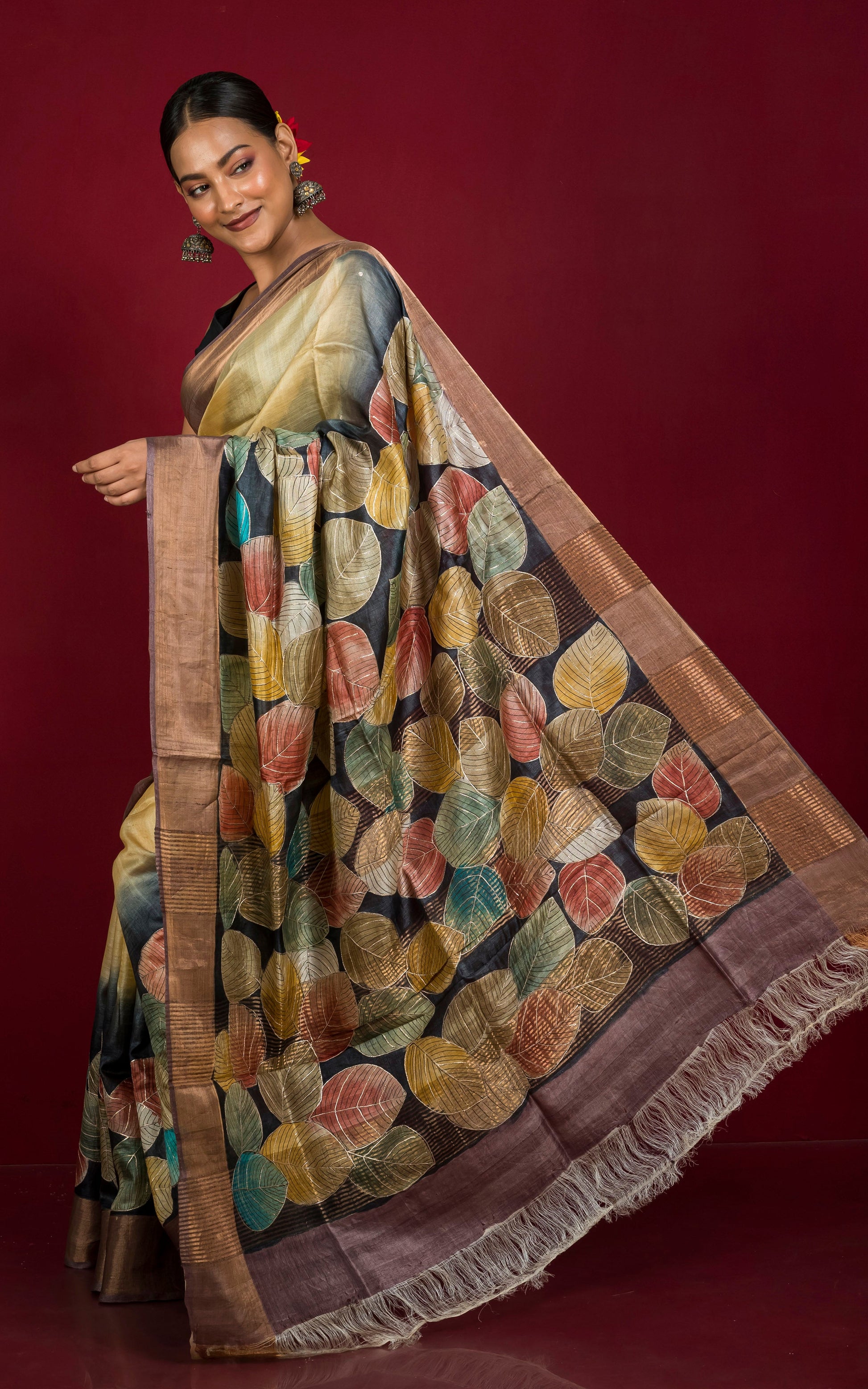 Designer Tussar Silk Saree in Beige, Black and Multicolored Prints embellished with Silver Zari Hand Embroidery Pitai Work