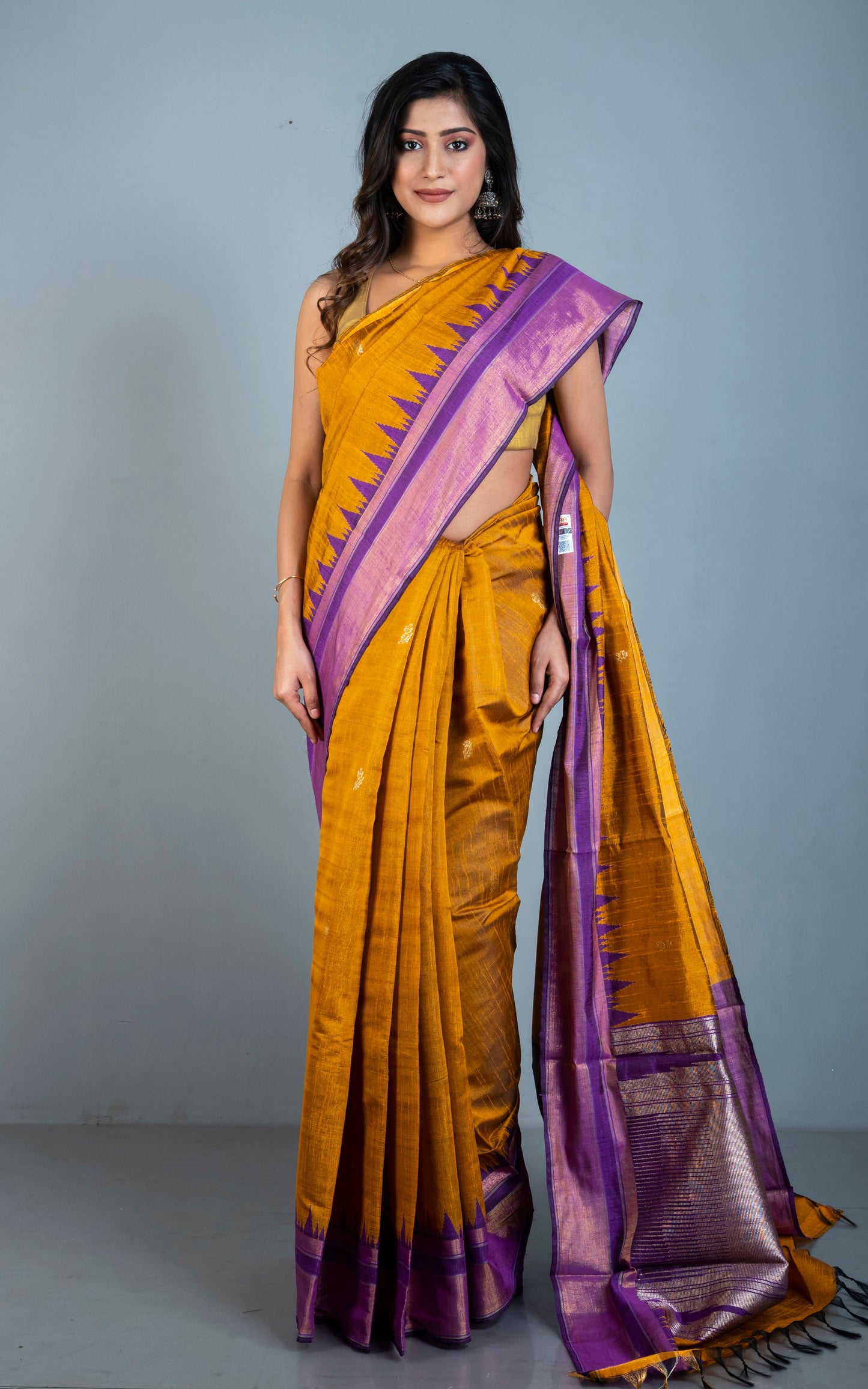 Handwoven Crowned Temple Border Tussar Raw Silk Saree in Mustard Golden and Purple with Rich Pallu