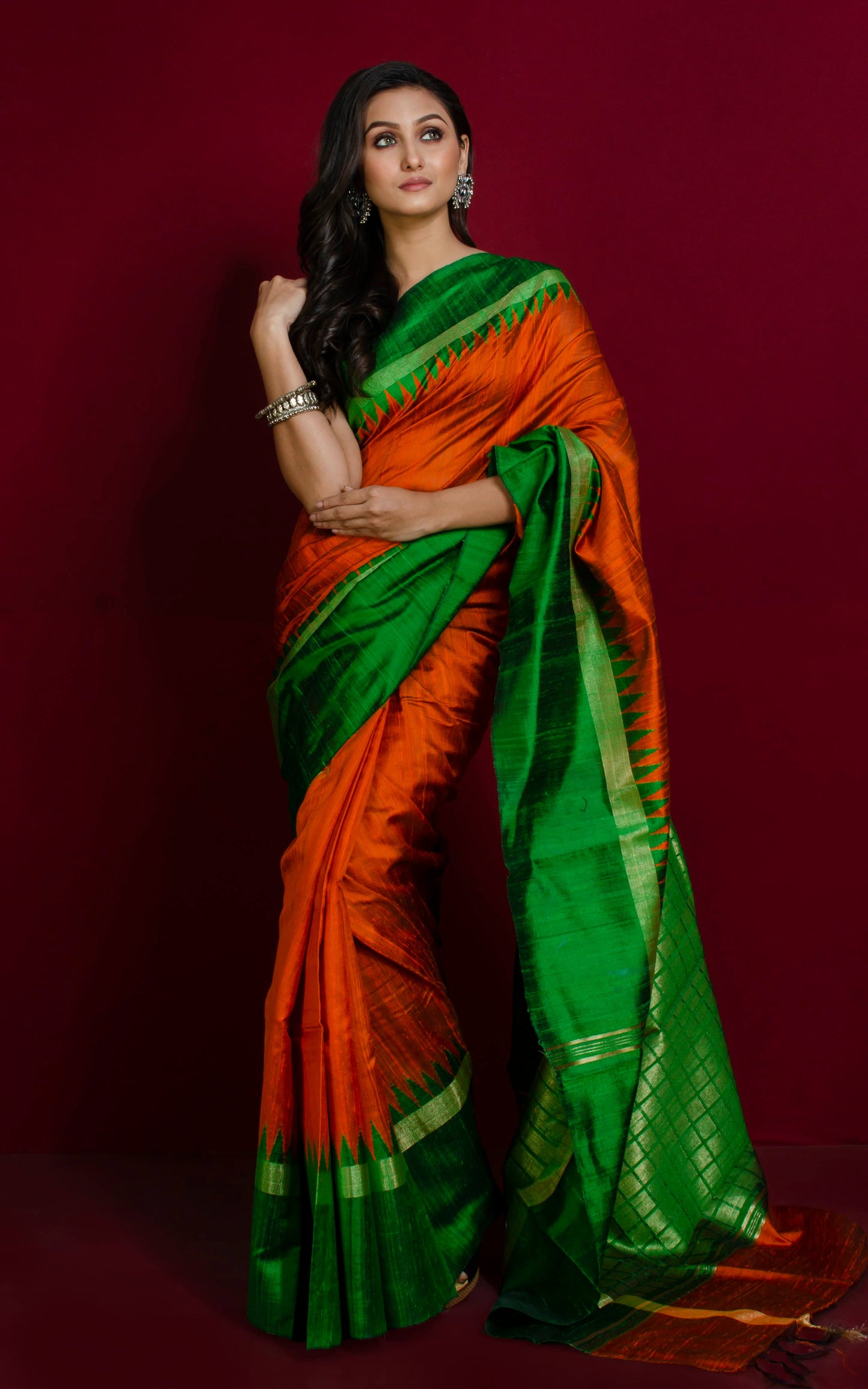 Handwoven Tussar Raw Silk Saree in Squash Orange, Emerald Green and Gold with Rich Pallu