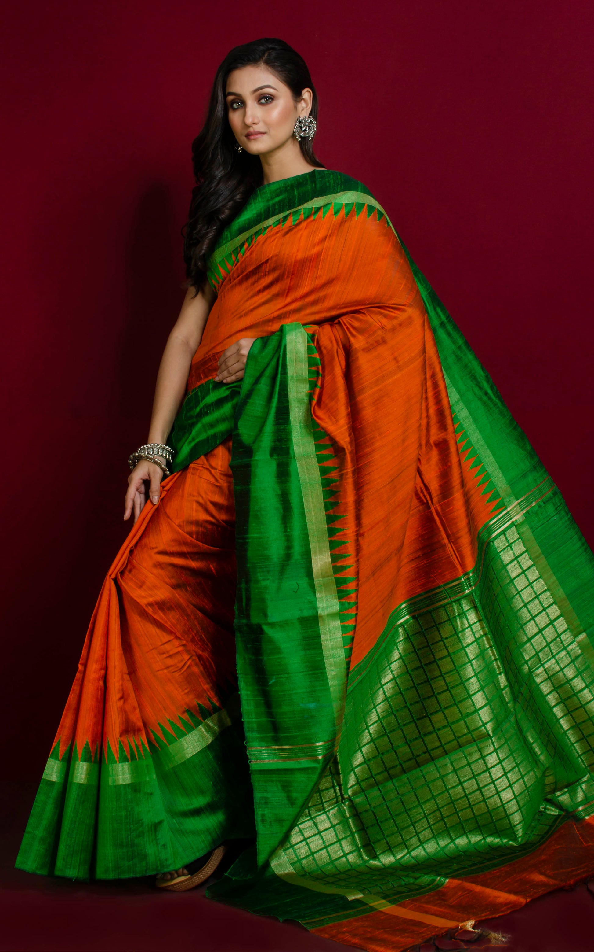 Handwoven Tussar Raw Silk Saree in Squash Orange, Emerald Green and Gold with Rich Pallu