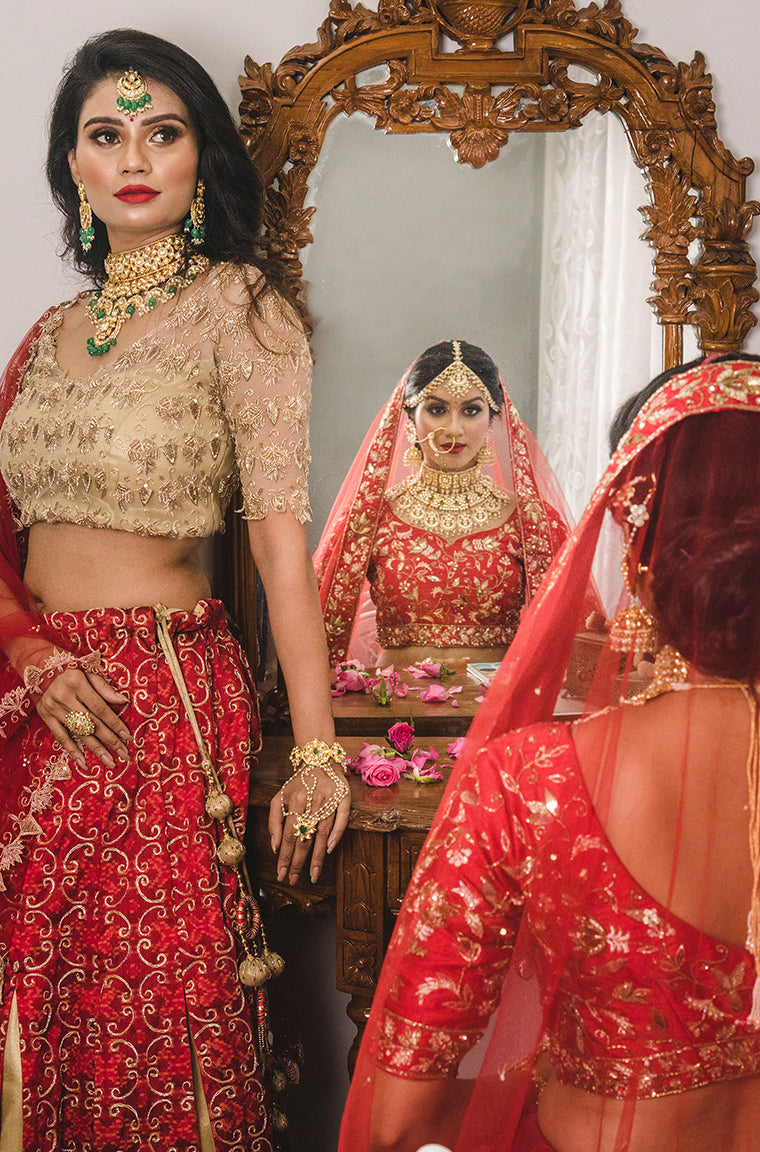 Red Raw Silk Leather and Aari work paradise lehenga